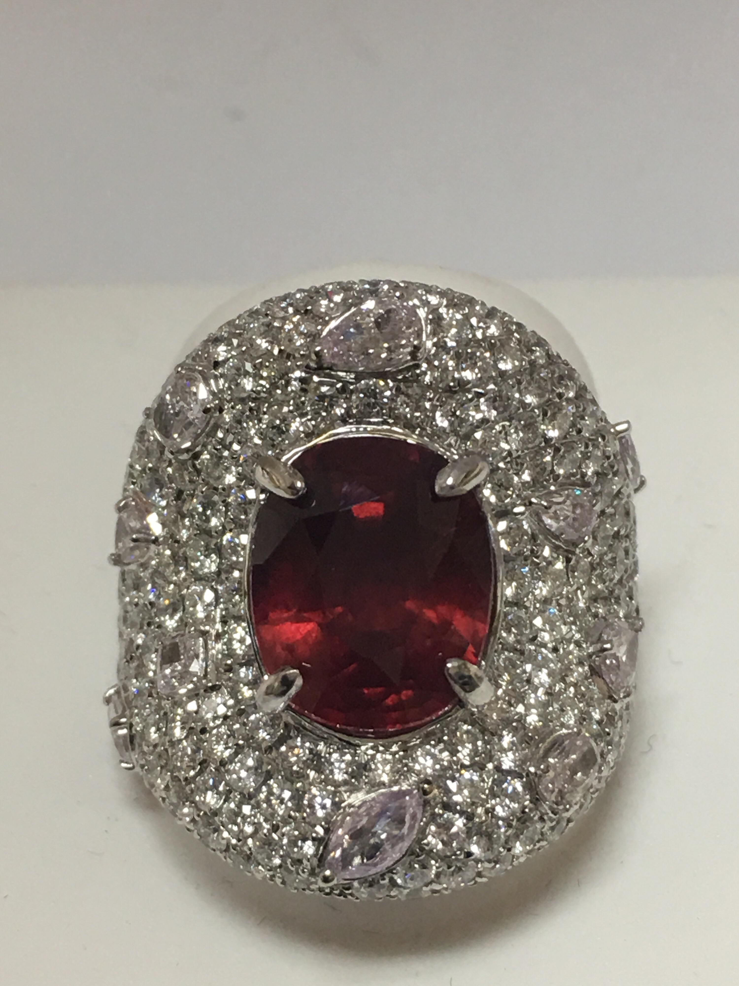 Natural GRS ( Swiss Lab ) Certified 5.52 Carat natural No heat Ruby with 0.88 Carat marquises Pink Diamond Set In 18 Karat White gold with additional 2.72 Carat White Round diamond is one of a kind Hand crafted Ring.