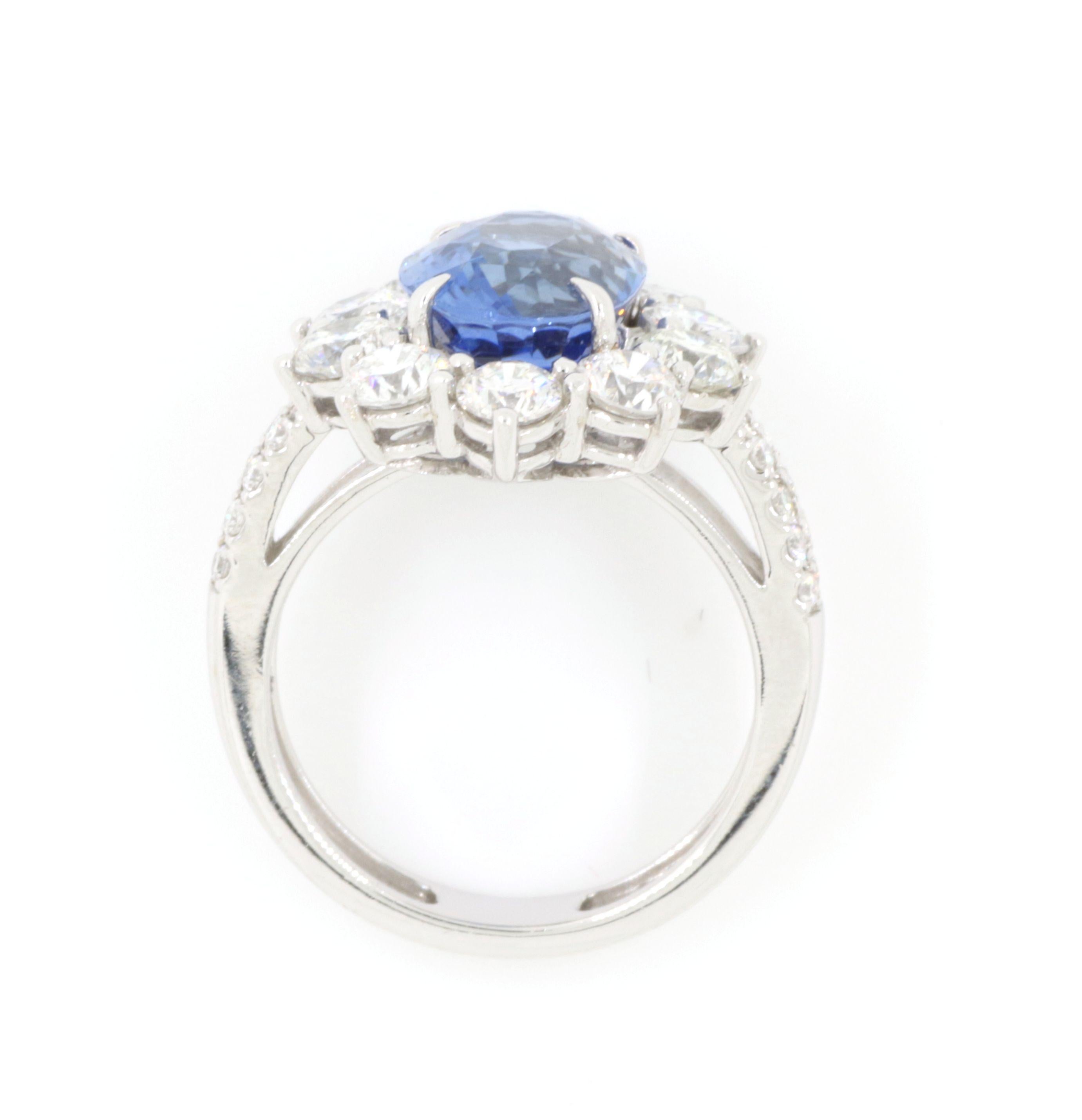 Oval Cut GRS Certified 5.55 Carat Blue Sapphire and Diamond Ring in 18K White Gold For Sale