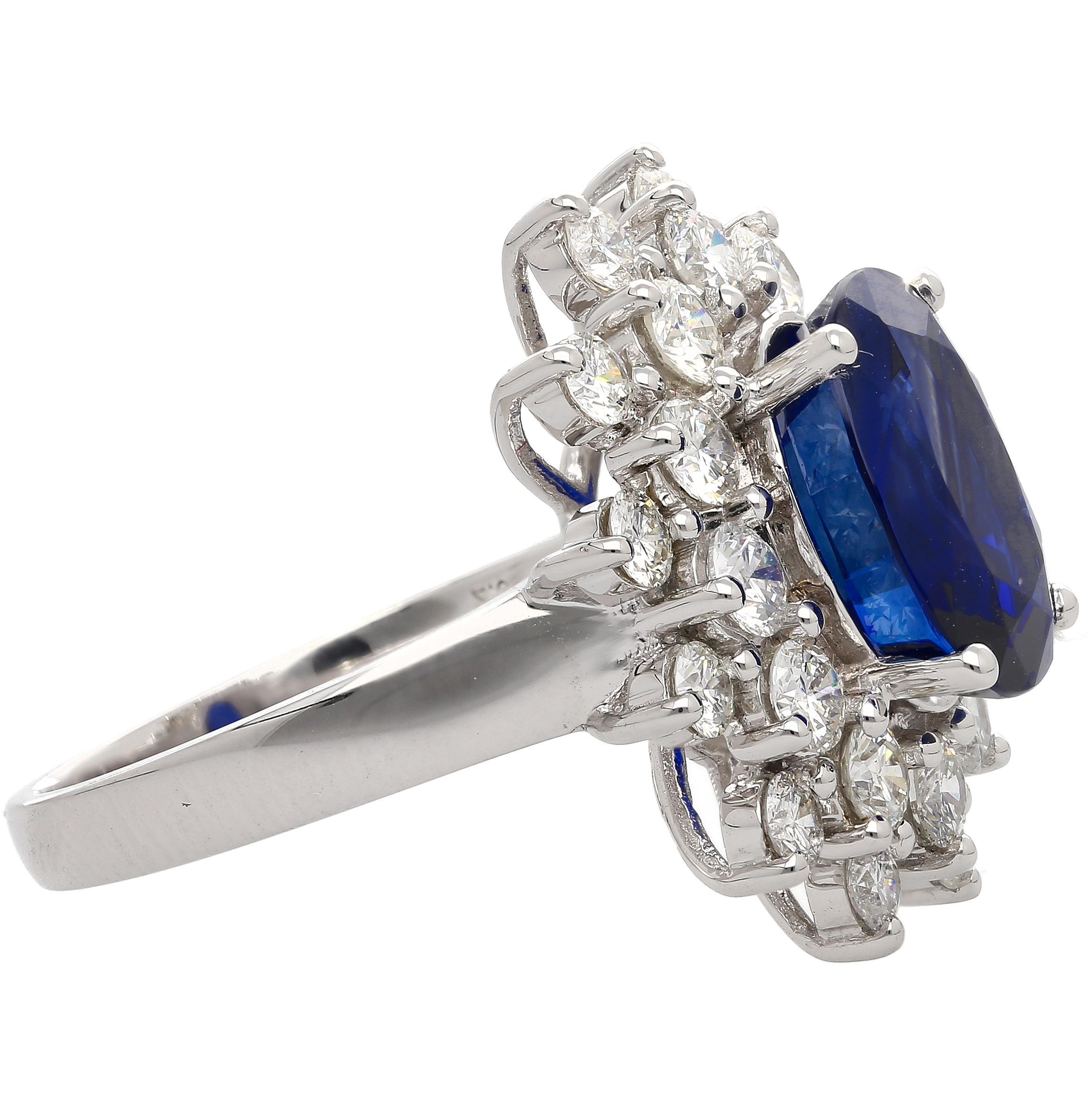 GRS Certified 5.79 Carat Oval Royal Blue Sapphire and Diamond Ring in 18K White Gold. The Sapphire has a GRS labs graded color grade of 