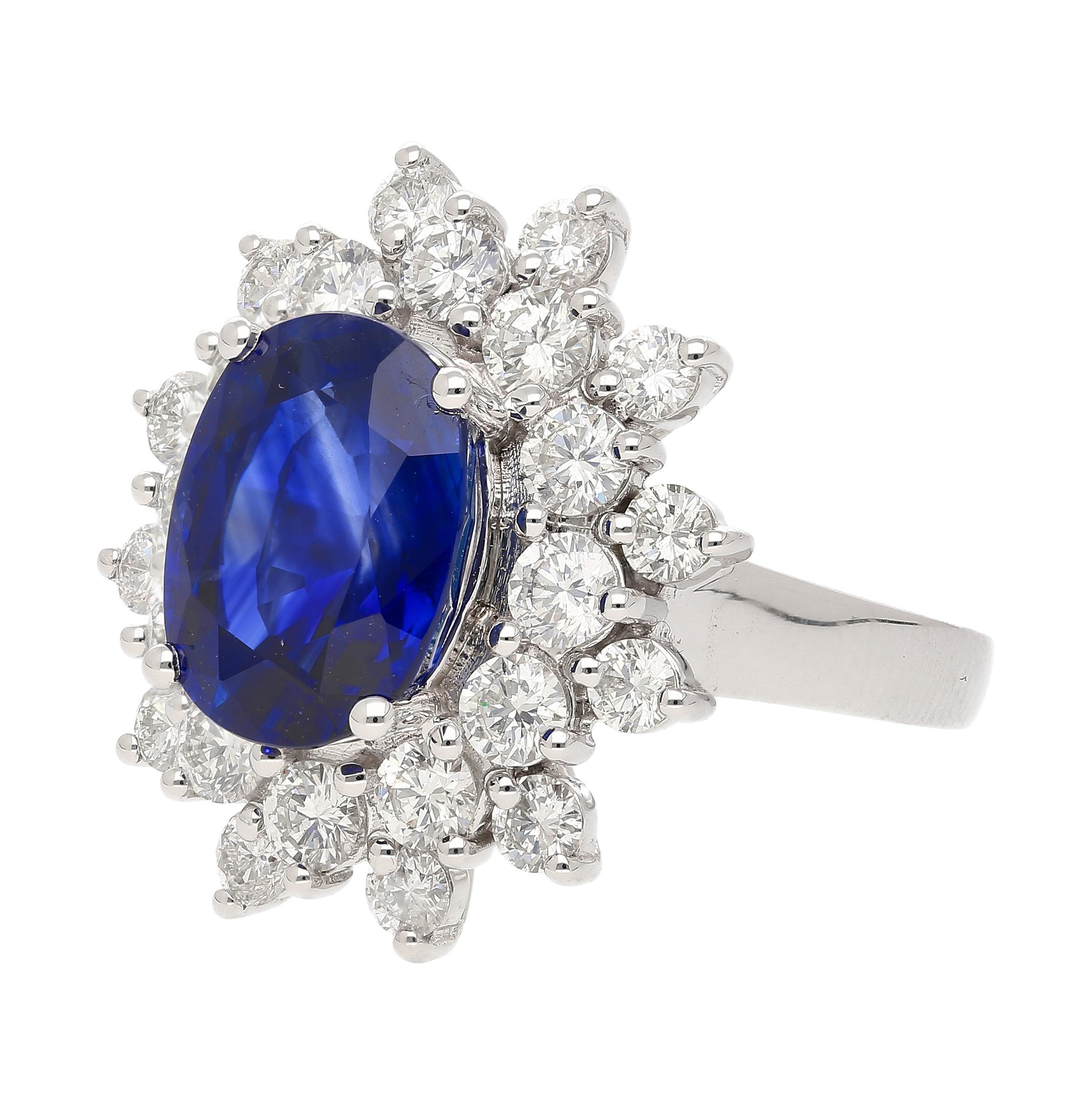 Oval Cut GRS Certified 5.79 Carat Oval Royal Blue Sapphire and Diamond Halo Ring For Sale