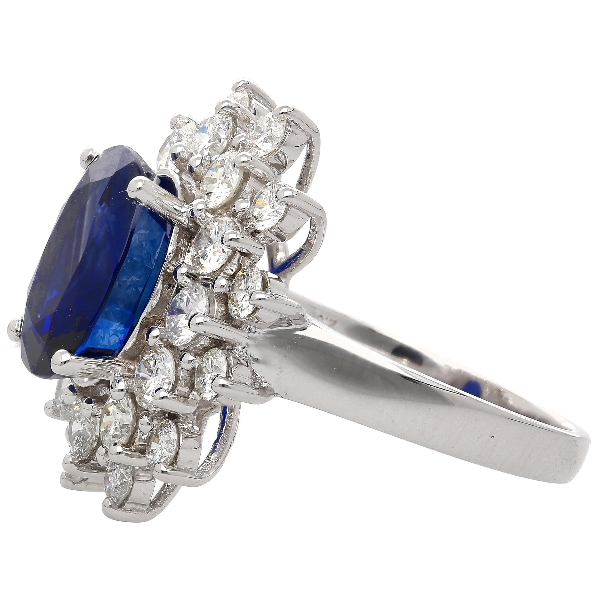 Women's or Men's GRS Certified 5.79 Carat Oval Royal Blue Sapphire and Diamond Halo Ring For Sale
