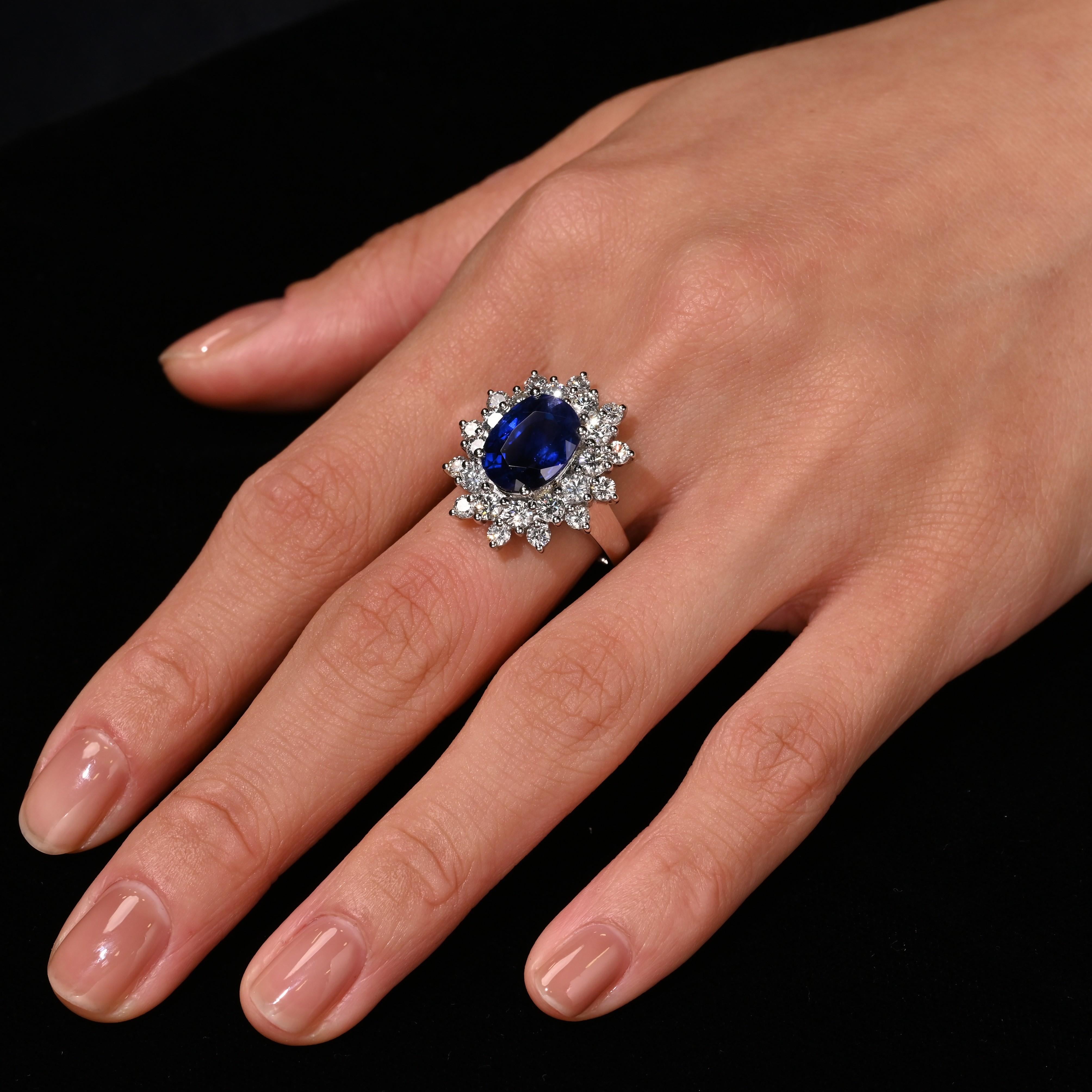 GRS Certified 5.79 Carat Oval Royal Blue Sapphire and Diamond Halo Ring For Sale 4