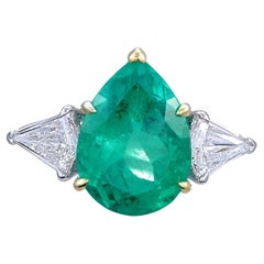 GRS Esmeralda colombiana certificada de 5,87 quilates Anillo de tres piedras