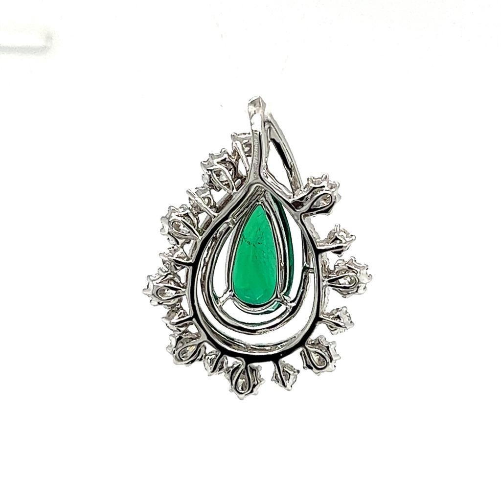 This is a stunning Emerald and Diamond Pendant weighing 6.03 carats in total.  This remarkable piece features a central pear-shaped emerald surrounded by 110 brilliant cut diamonds of various sizes set on 18 Karat White Gold.  Originated from