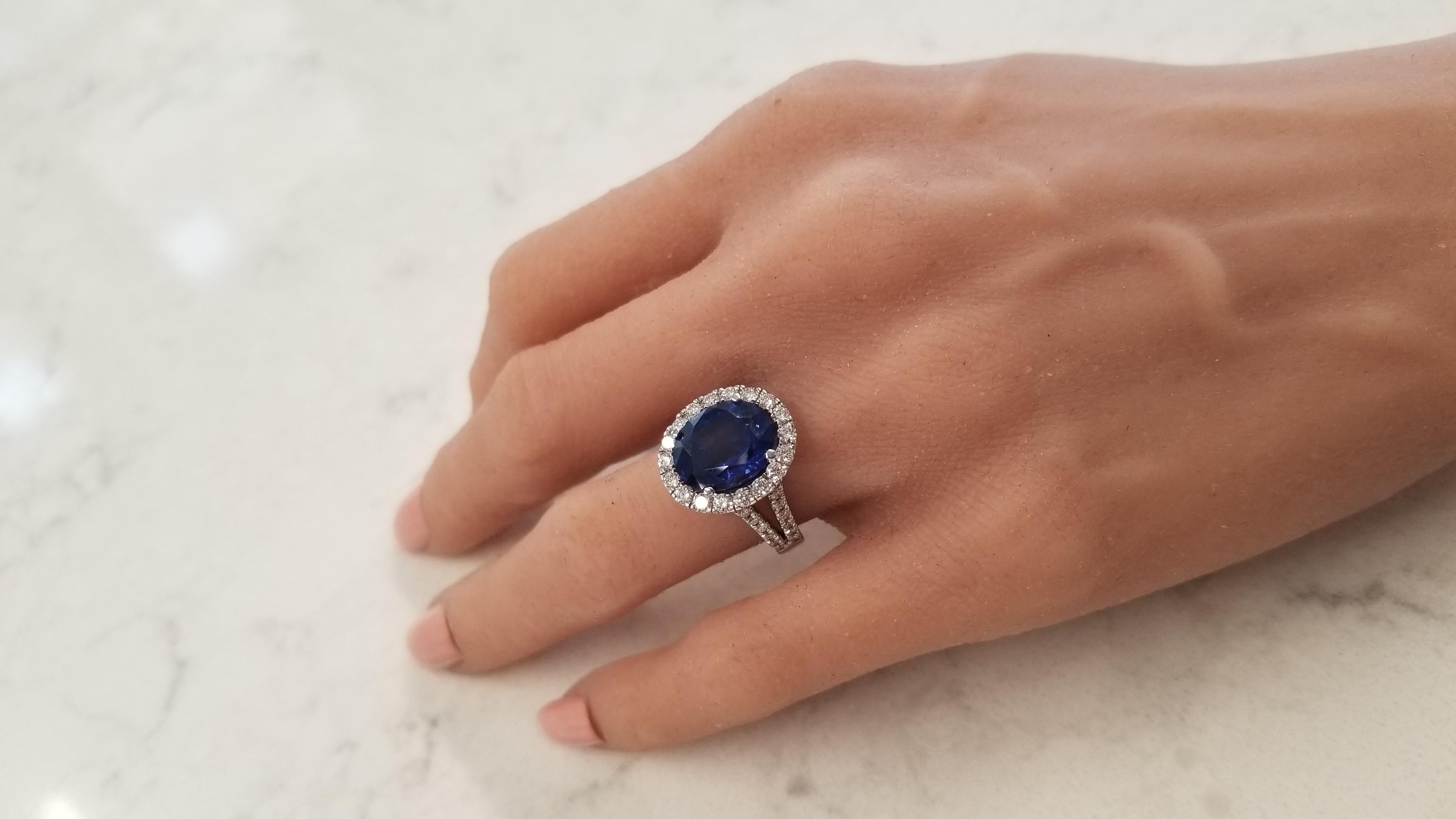 This is a GRS certified intense royal blue sapphire that weighs 6.18 carats and measures 11.88 x 9.83 x 6.51mm in a centered prong setting. The gem source is Sri Lanka; having its size with the excellent transparency and luster is a difficult