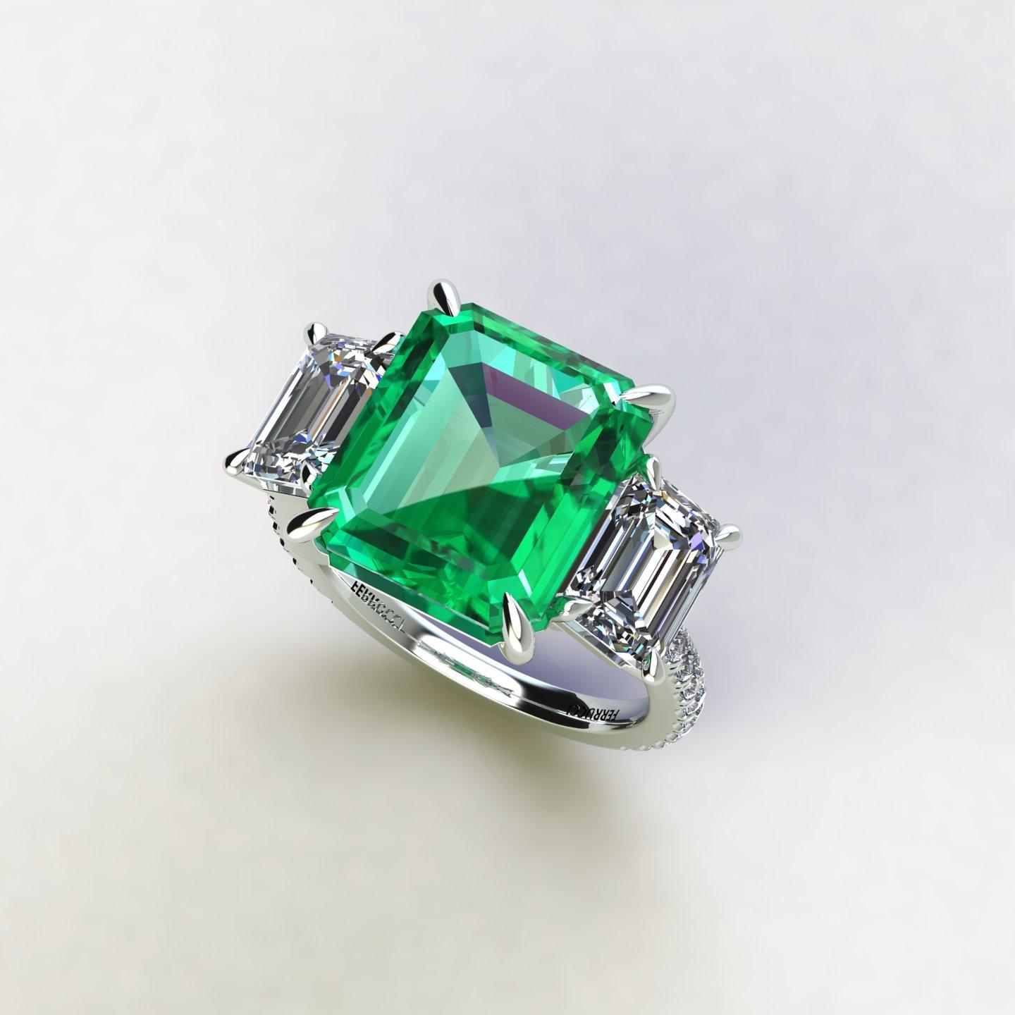 GRS Certified 6.31 carat Colombian emerald cut Emerald, very high quality color,  sided by two 1 carat Emerald white diamond, H color, VS clarity, GRS Certified embellished by a pave' of bright diamonds of approximately  total carat weight of 0.30