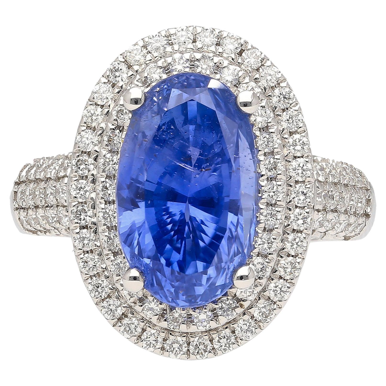 GRS-zertifizierter 6,34 Karat unbehandelter Ring aus Sri Lanka mit ovalem blauem Saphir und Diamanten  im Angebot