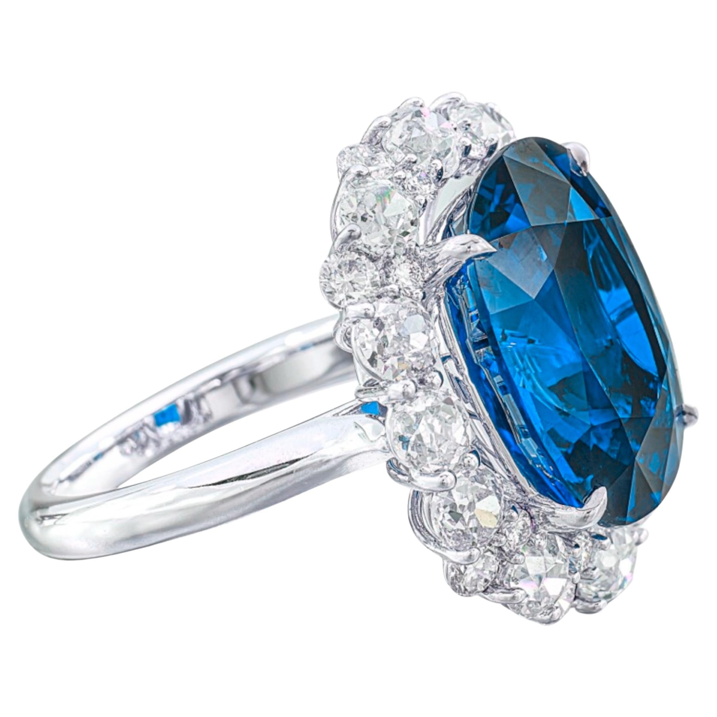 This exquisite ring by Cecile Blake is crafted in platinum and features a stunning 7.54 carat oval blue sapphire  as its centerpiece. The sapphire is Grs certified, showcasing exceptional quality with the following attributes:

Carat Weight: 7.54 ct
