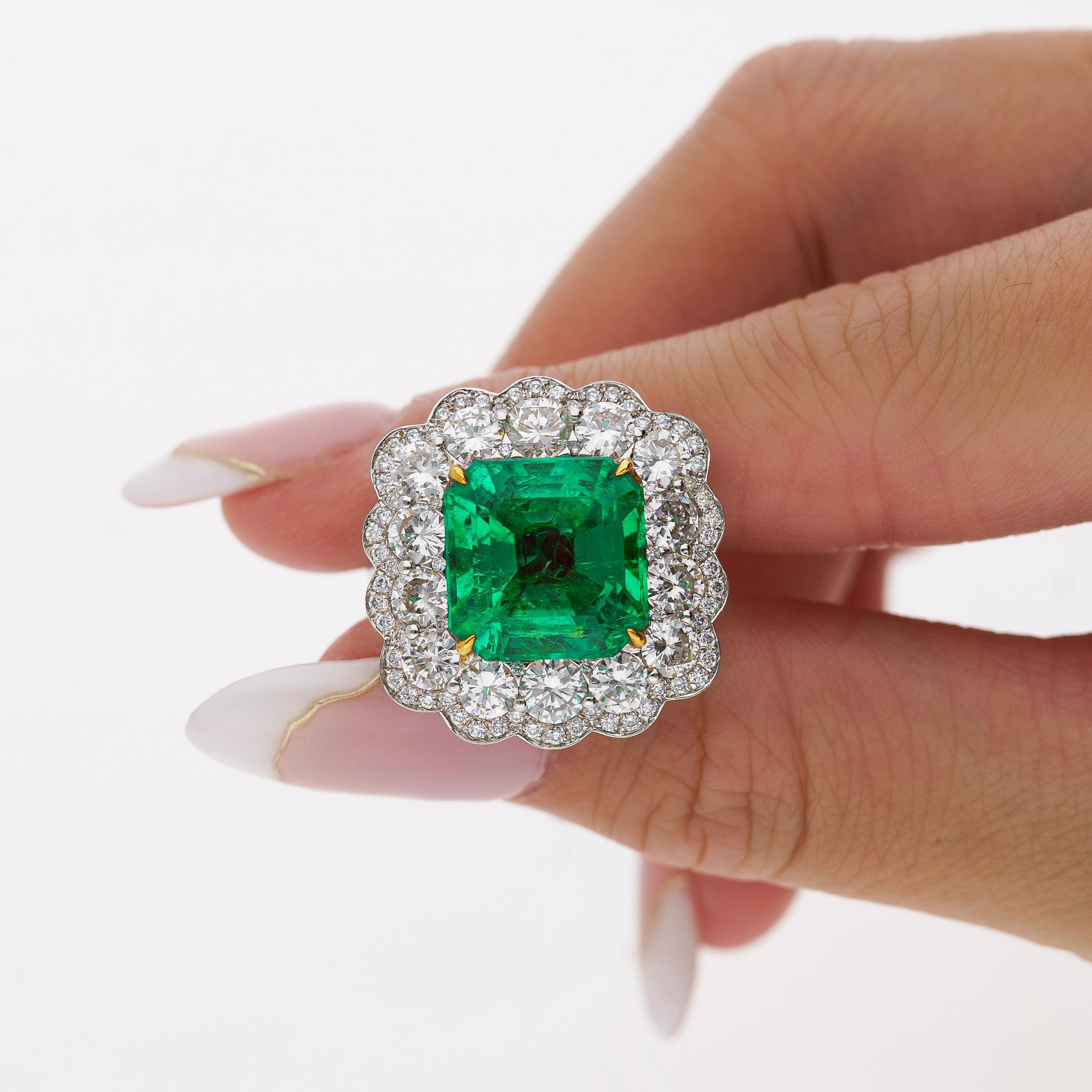 Contemporary GRS Certified 8.04 Carat Minor Oil Colombian Emerald & Diamond Halo Ring For Sale