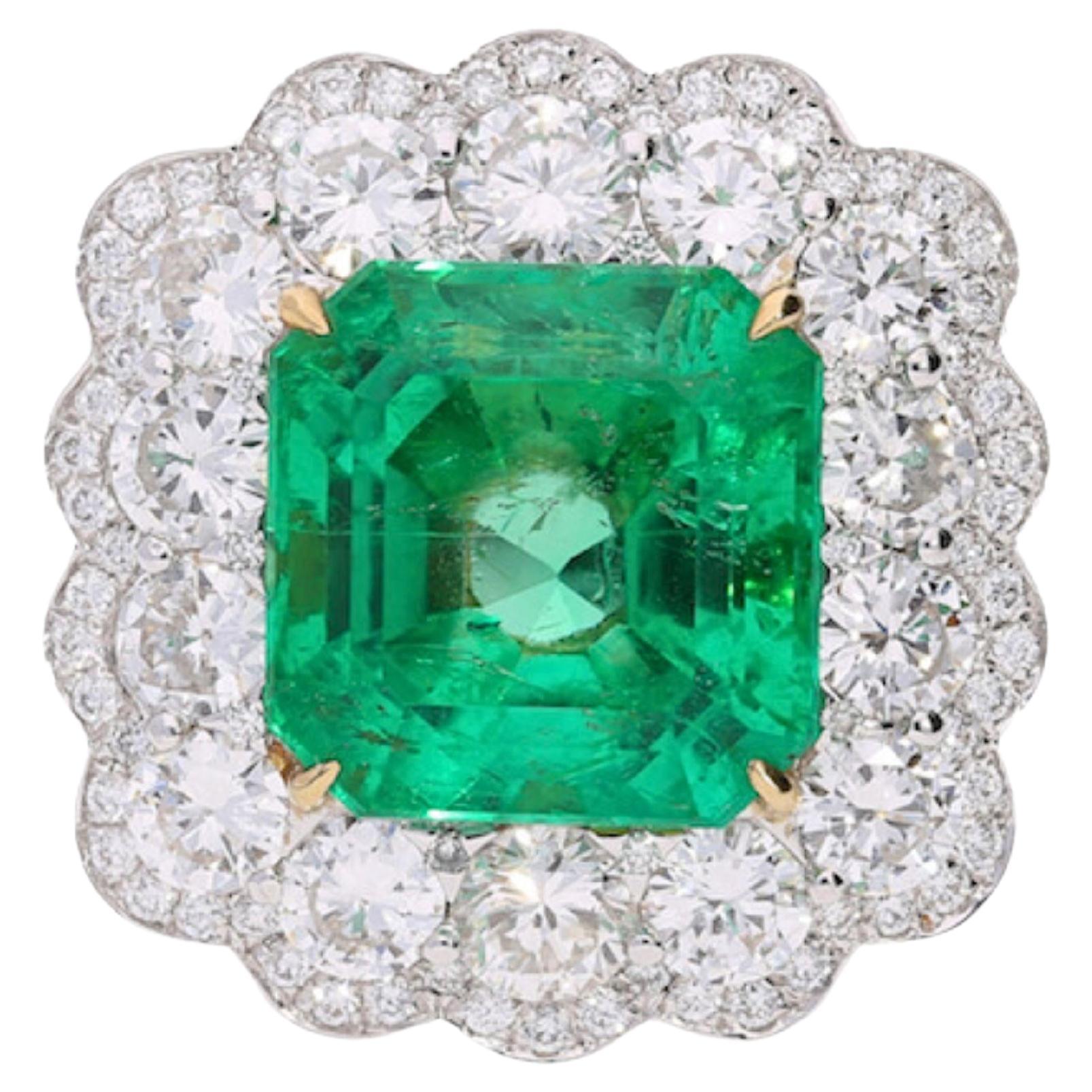 GRS Certified 8.04 Carat Minor Oil Colombian Emerald & Diamond Halo Ring For Sale