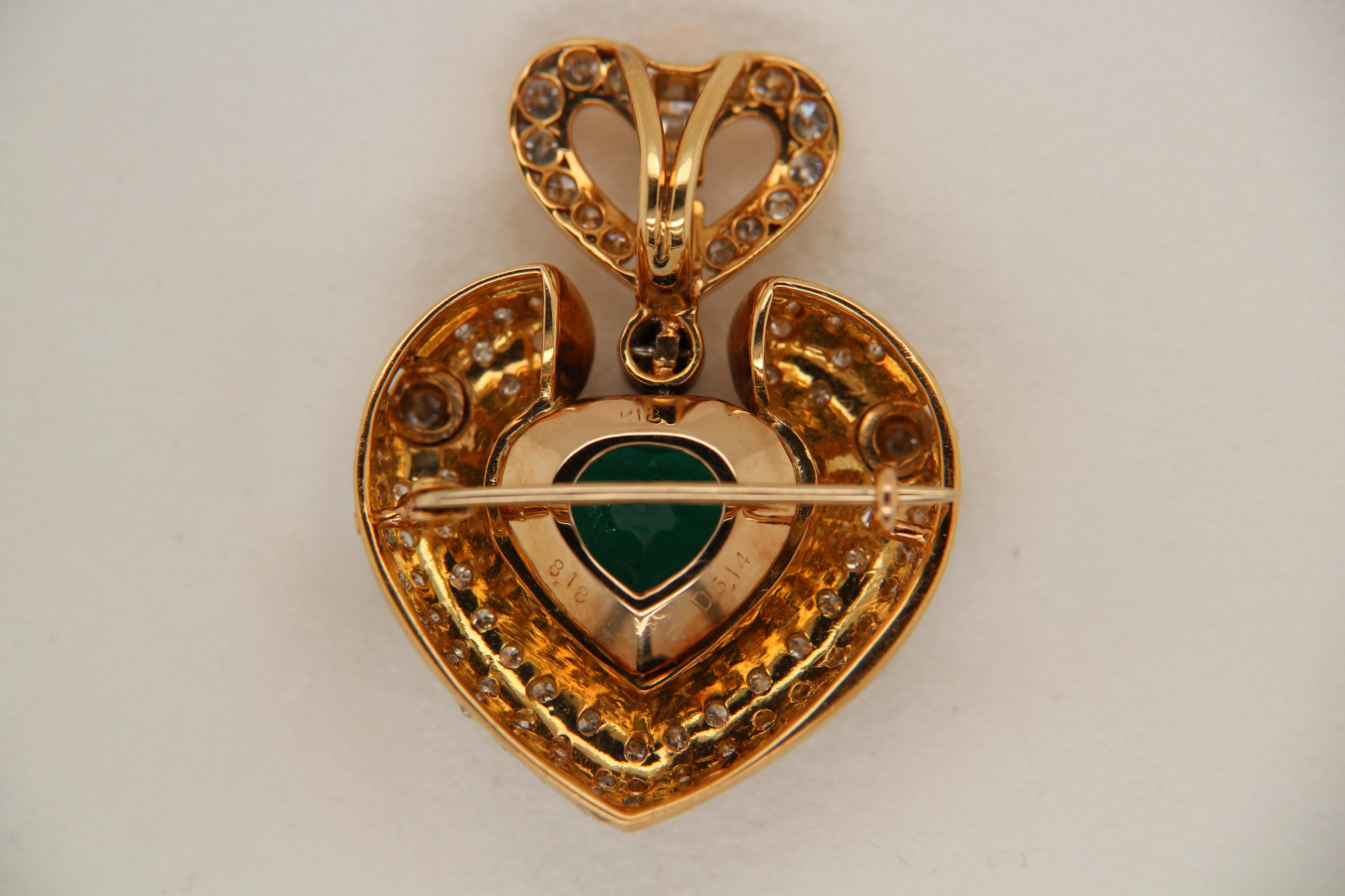 A brand new emerald and diamond pendant in 18 karat gold. The centre stone is an 8.18 carat Colombian emerald with minor oil certified by GRS, Gem Research-lab Switzerland. The total diamond weight is 1.45 carats and the whole pendant weighs 19.98