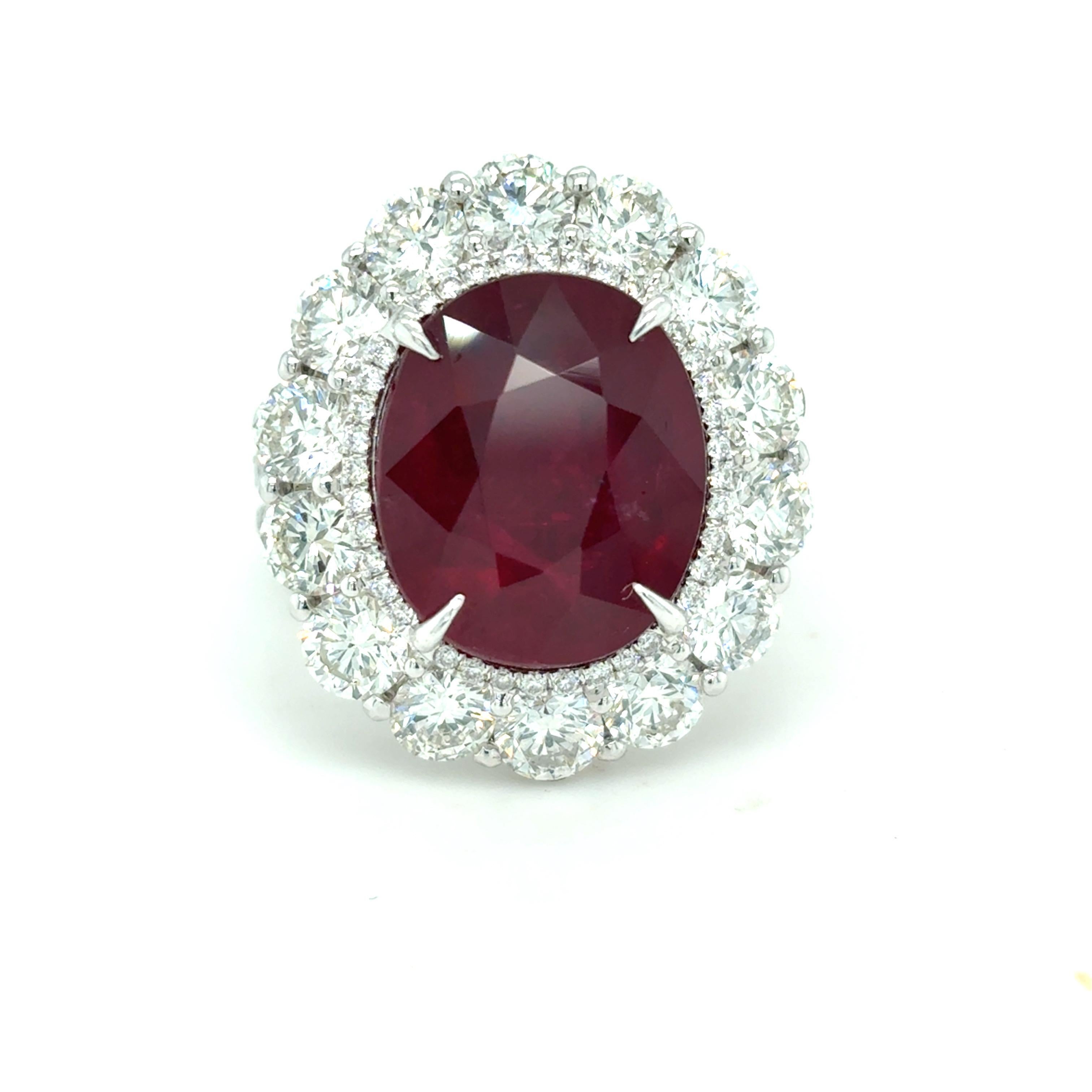 GRS-Certified 9.04 Carat Mozambique Ruby Ring
This stunning ring features a GRS-certified 9.04 carat Mozambique ruby at its center, encircled by a dazzling 4.20 carats of brilliant-cut white diamonds in a radiant halo setting. Expertly crafted in