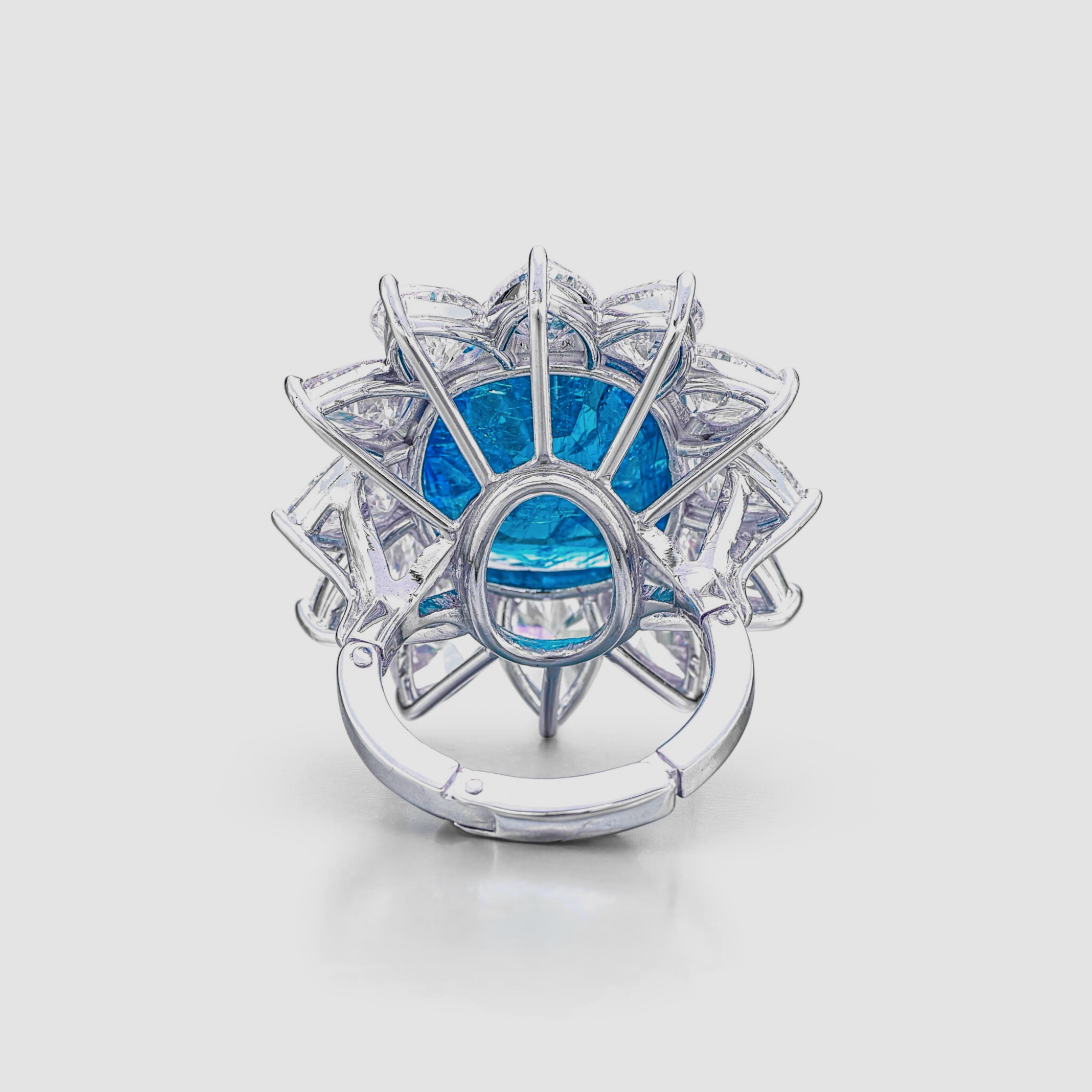 This exquisite ring by Cecile Blake is crafted in platinum and features a stunning 9.78 carat cushion blue sapphire  as its centerpiece. The sapphire is Grs certified, showcasing exceptional quality with the following attributes:

Carat Weight: 7.54
