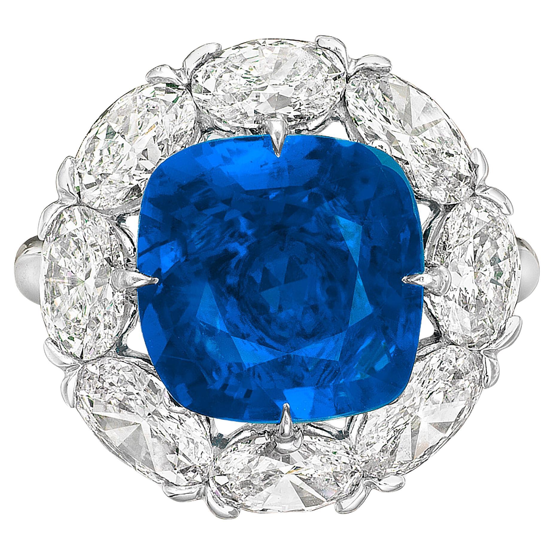 A SUPERB SAPHIRE AND DIAMOND RING, BY Cecile Blake
Cushion-shaped ruby of 9.89 carats, oval-cut diamonds that sum 2 carats set in solid platinum
f color vvs1 clarity diamonds

GRS report Burma (Myanmar), no indications of heating