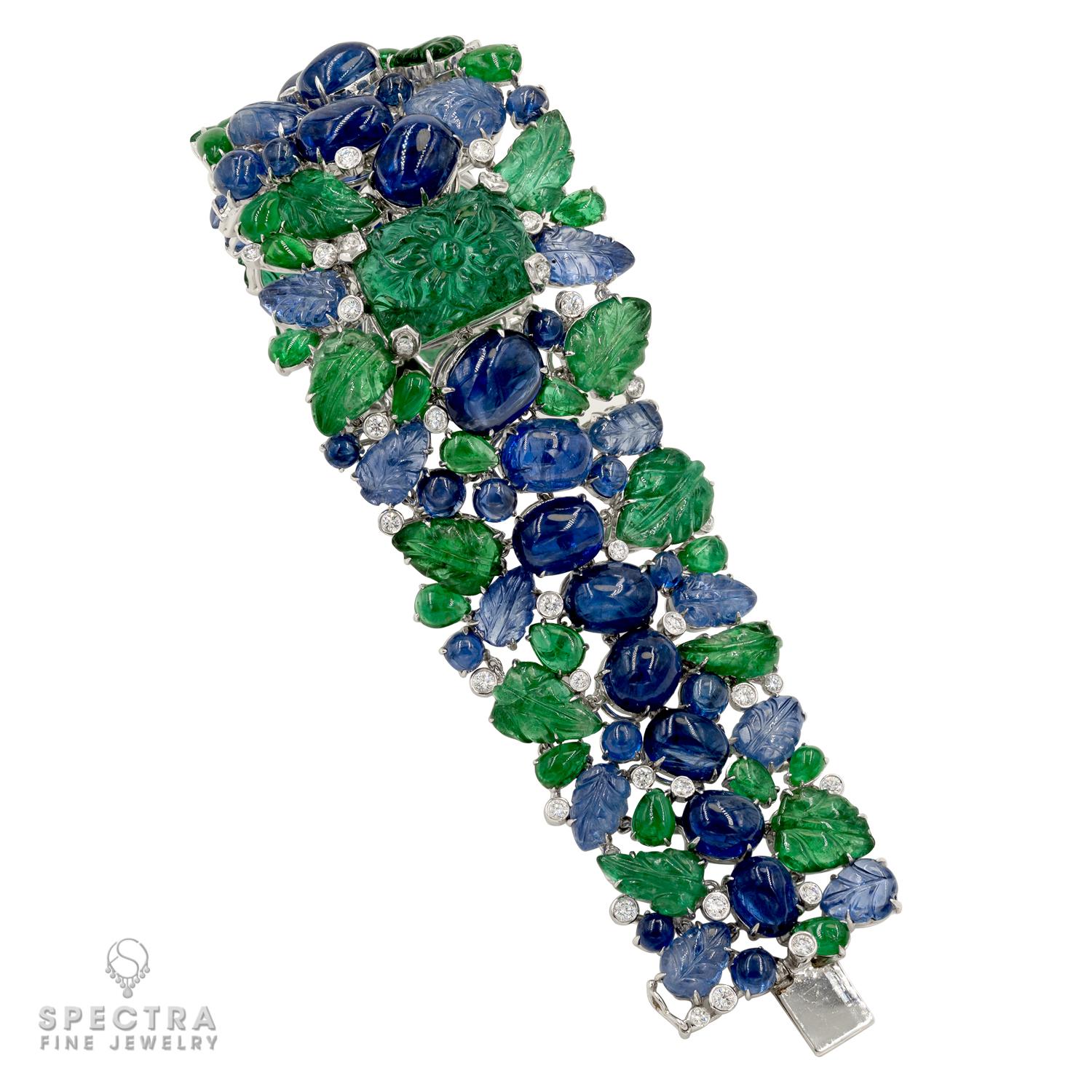 This vibrant Emerald Sapphire Diamond Bracelet made in the Contemporary Era, circa 2000s, is rich tapestry of spectacular gemstones. The 6.75-inch (17.15 cm) bracelet crafted in 18K white gold shows very little metal save for the mountings and