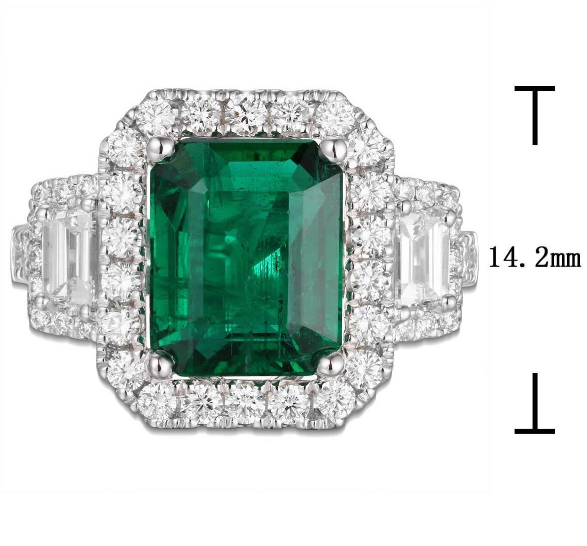 An Emerald statement cocktail ring is a great way to create an elegant, glamorous look.
The center stone is emerald-cut in shape and has gorgeous facets. For extra sparkle, it has been framed by 0.41carat trapezoid side and 48 round brilliant-cut