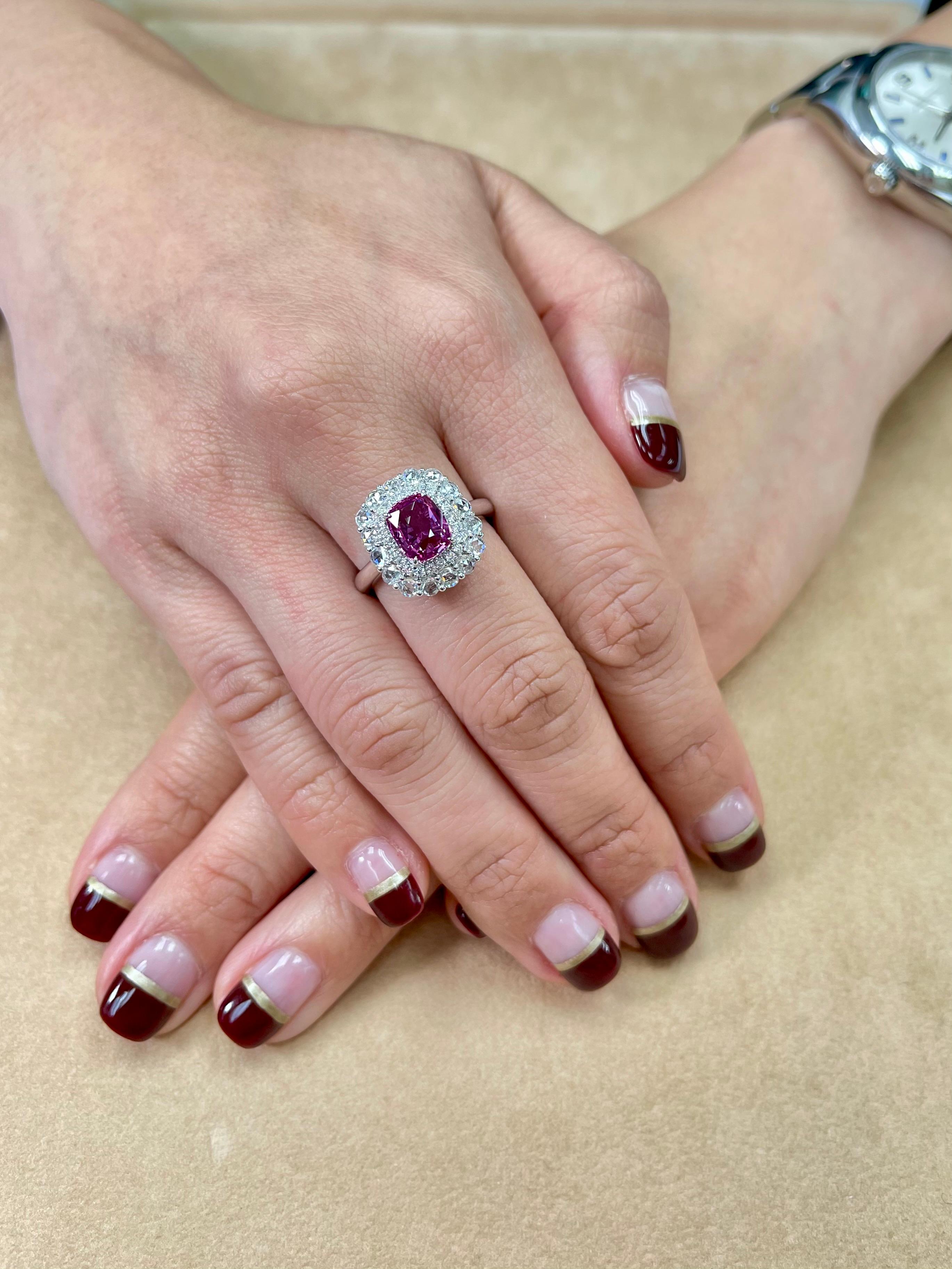 Please check out the HD video! 99% of all pink sapphires are heat treated to improve the color and clarity but this one is spared from any treatment. We would describe the color of this natural no heat sapphire as vivid pink. The ring is set in 18k