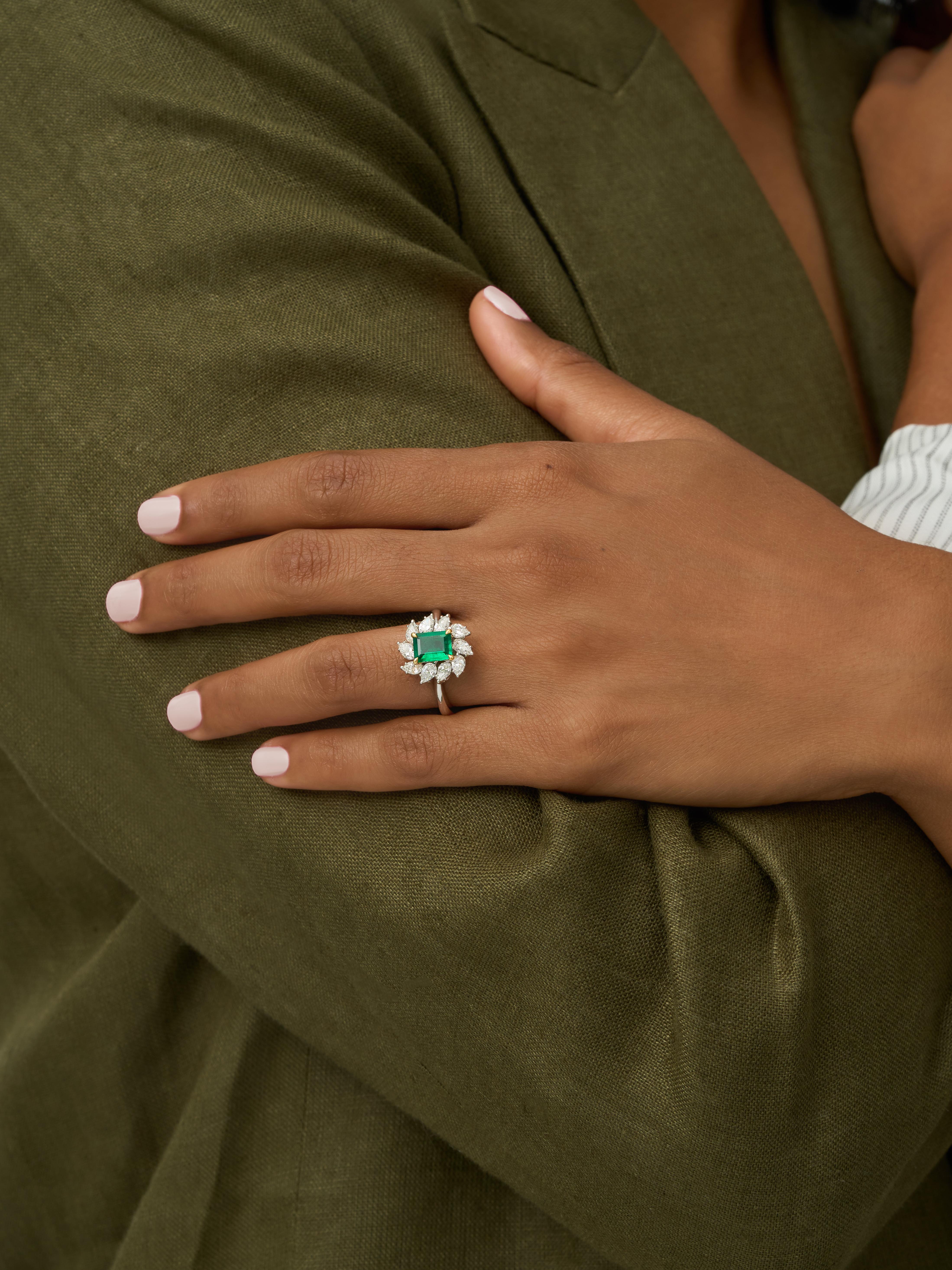 Gemstone:  Natural Afghan Emerald
AAAA highest heirloom quality 
Colour: Vivid Green 
Weight of Emerald : 1 carat
Conflict free natural diamonds. Weight of diamonds: 1.3 carats
Metal: 18K White Gold 
Certificate: Gem Research SwissLabs (GRS) 

The