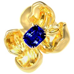 Broche sculpturale en saphir bleu royal d'un carat en or dix-huit carats