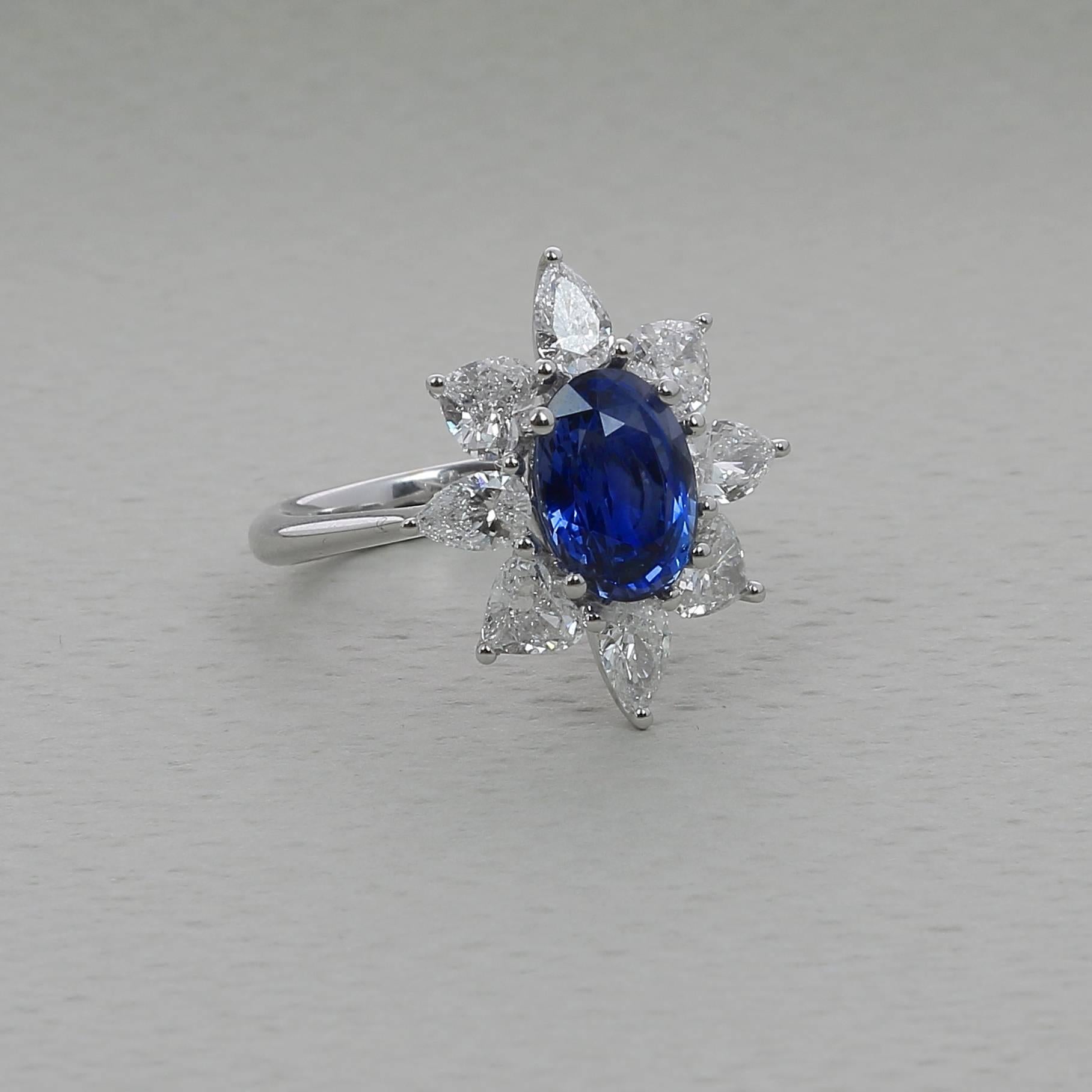 Contemporary 3.18 Carat Blue Sapphire Ring / 1.91 Cts Pear Diamonds Hearts Diamond Ring For Sale
