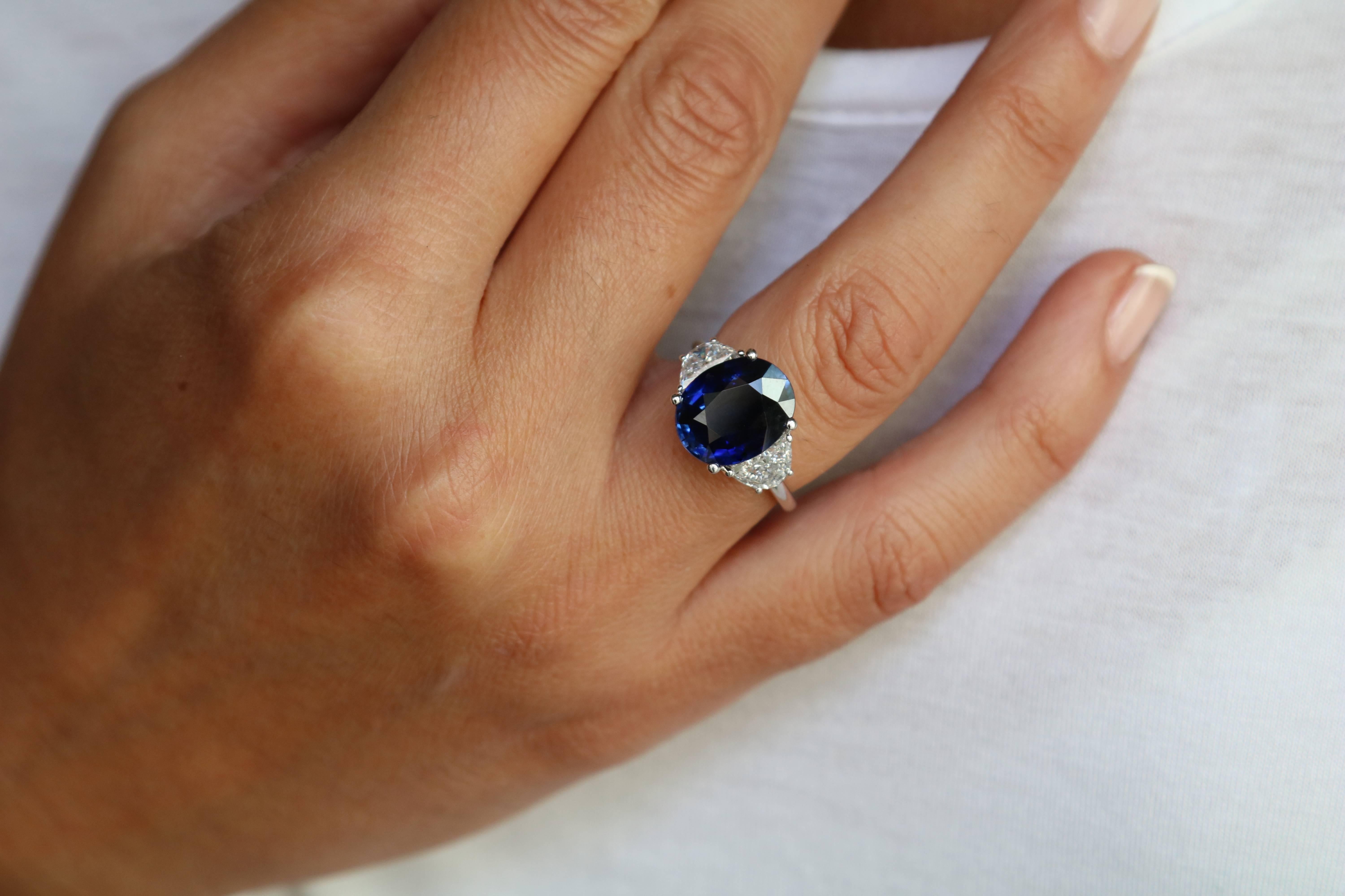 Oval Cut 6.19 Carats Deep Blue No Heated Sapphire Ring set Half-Moon White Diamonds  For Sale