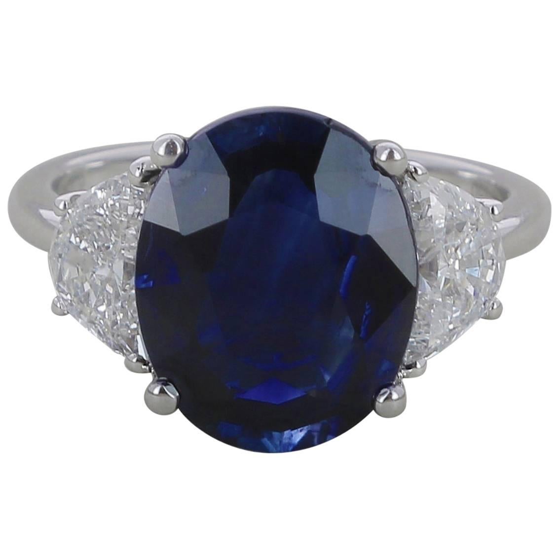 6.19 Carats Deep Blue No Heated Sapphire Ring set Half-Moon White Diamonds  For Sale