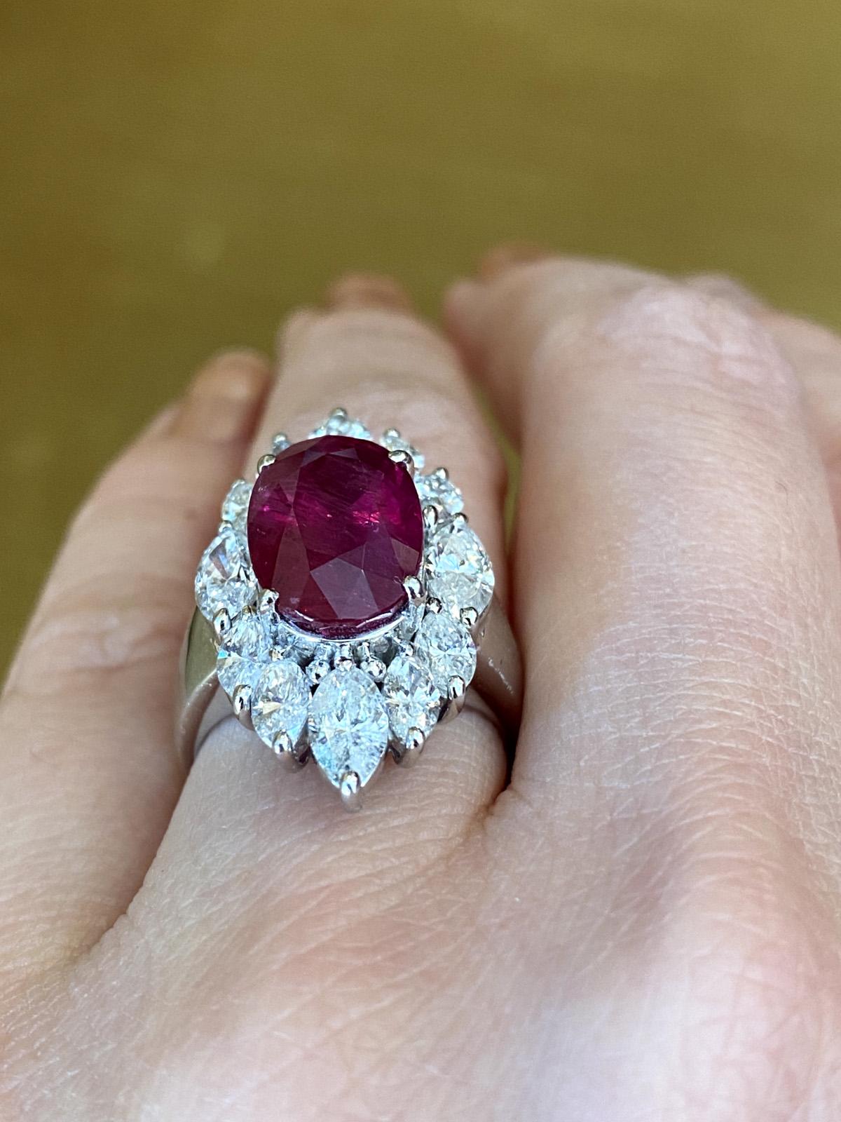 Women's GRS Certified Oval Ruby 7.02 carat and Diamond Halo Cocktail Ring in Platinum For Sale