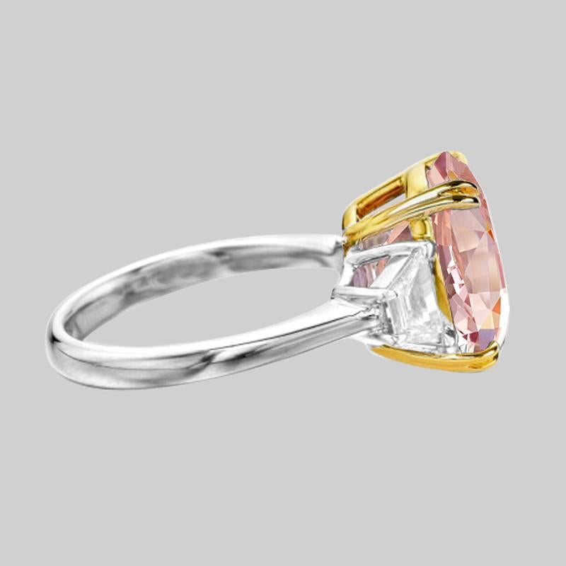 GRS Certified Padparadscha Orange Pink 8.50 Carat Oval Solitaire Ring
The side diamonds are GIA certified half moon diamonds
set in 18 carats yellow gold and platinum