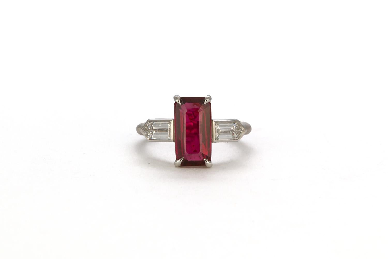 We are pleased to offer this GRS Certified Platinum Ruby & Diamond Ring. This stunning ring is a brand new vintage recreation and feature a GRS Certified vivid red pigeon's blood 4.00ct emerald cut natural ruby from Mozambique accented by 0.98ctw