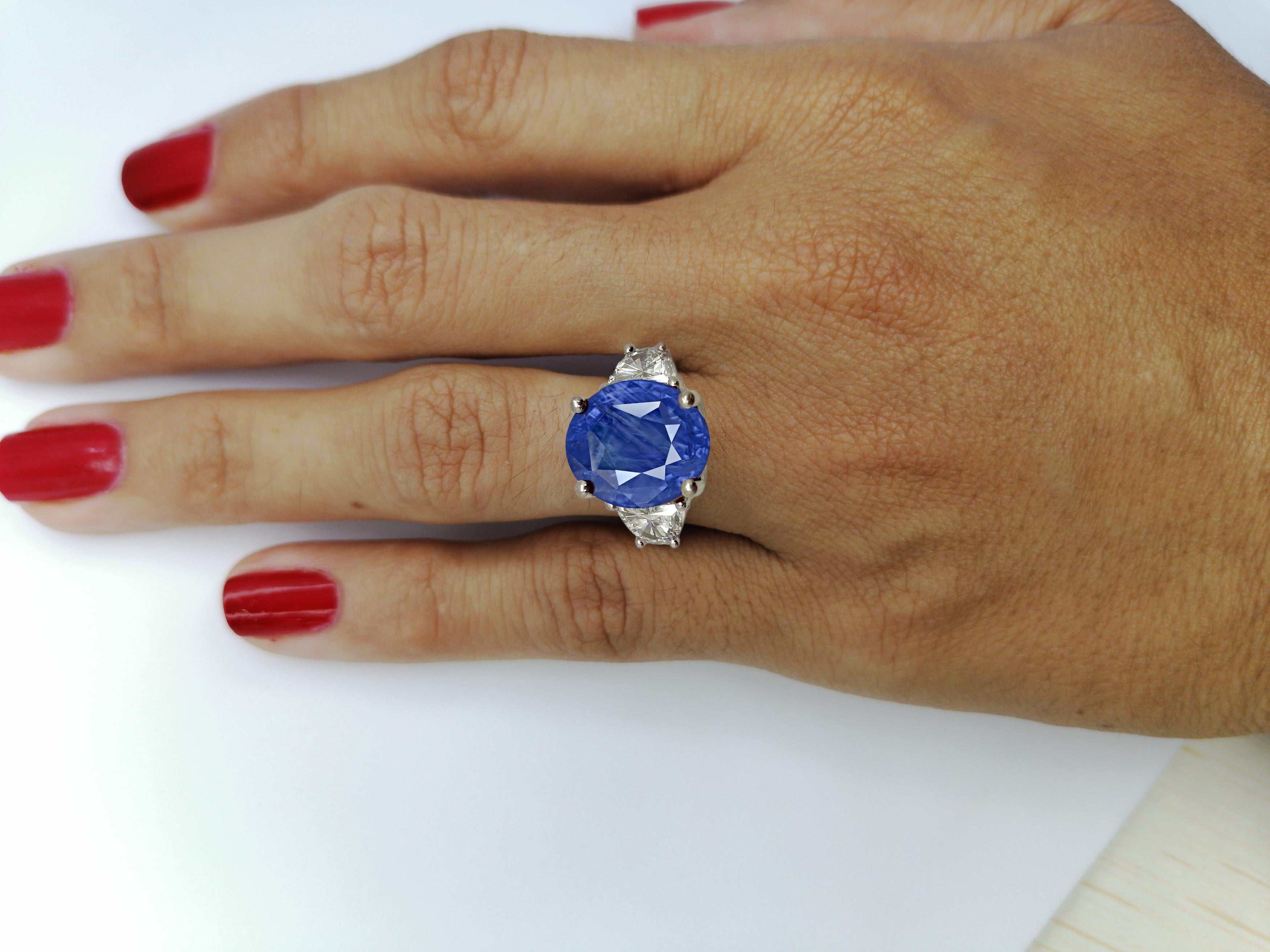 Hand crafted  Solitaire Engagement ring. Set with one Spectacular Natural Sapphire, 13 Carats Sri Lanka Blue color certified by Gia and GRS Switzerland with No Heat Treatment. 

