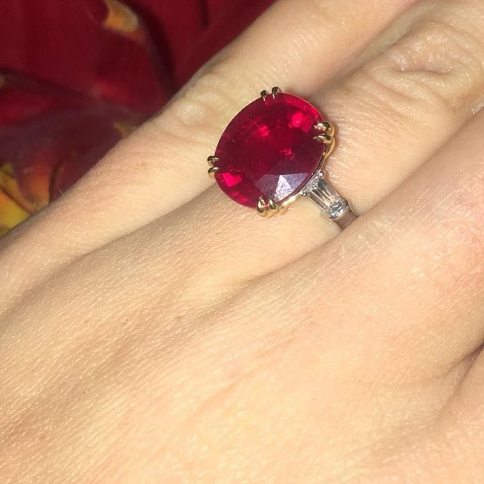 An exquisite 4.21 Carat Oval Peagon Blood Red Ruby and Diamond Ring.

This ruby has an incredible color and is quite large it has been certified by two different laboratories GRS Switzerland.