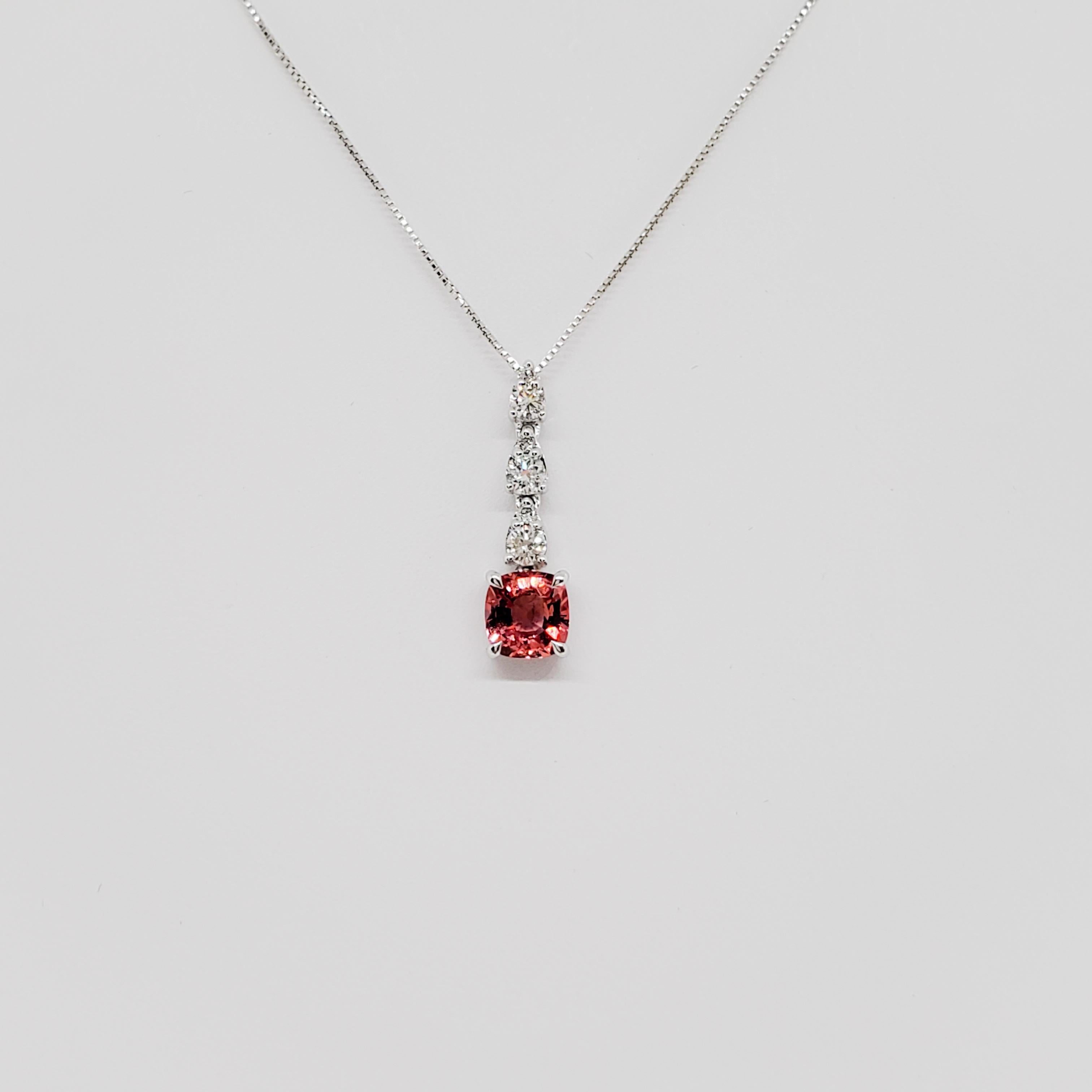 Gorgeous 1.14 ct. padparadscha cushion shape with good quality white diamond rounds in a handmade 18k white gold necklace.  Comes with GRS Lab report.
