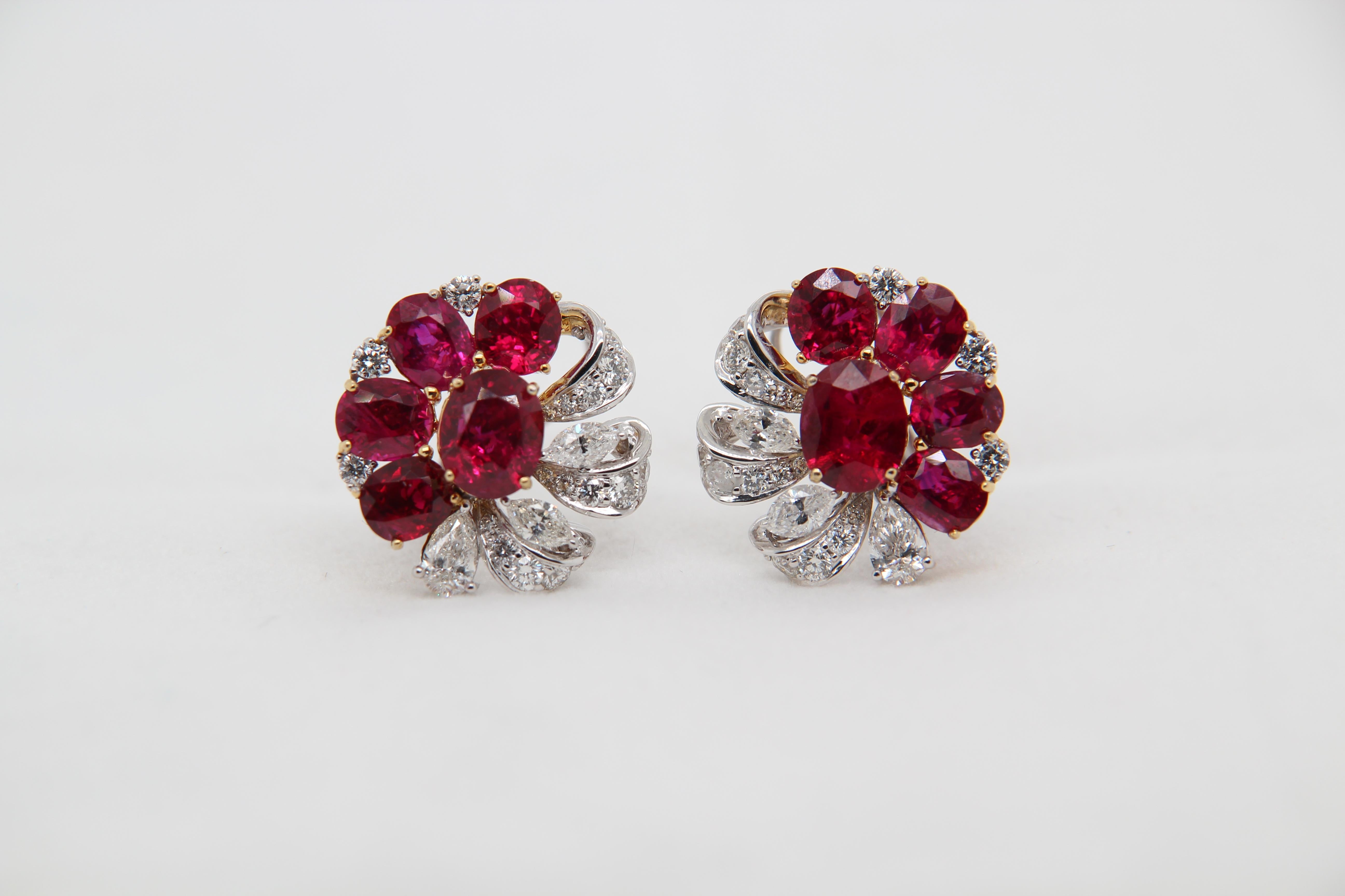 Earrings made from Burmese unheated rubies and diamond earrings. The centre two rubies are of weight 1.02 and 1.62 carat and are both certified by Gem Research Swisslab (GRS) unheated and 'Pigeon's Blood'. The two centre stones as well as the