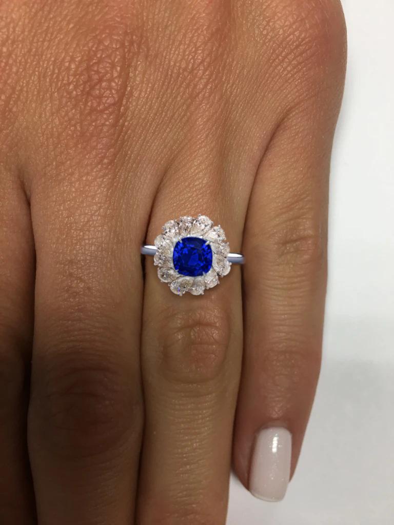 GRS SWITZERLAND 3.50 Carats Vivid Royal Blue Sapphire Pear Cut Cocktail Ring  
the main stone is an incredible vivid blue sapphire with VS1 clarity!! something very rare to find in unheated sapphires with this incredible color

the side diamonds are