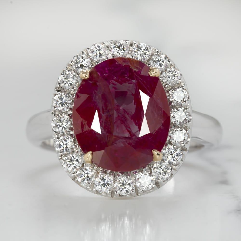 Oval Cut GRS Switzerland 4.50 Carat Certified Oval Ruby with Diamond Halo Ring