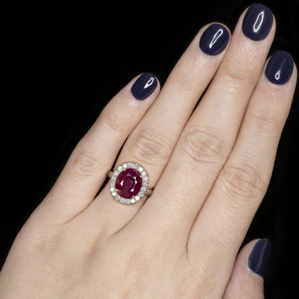 Women's or Men's GRS Switzerland 4.50 Carat Certified Oval Ruby with Diamond Halo Ring