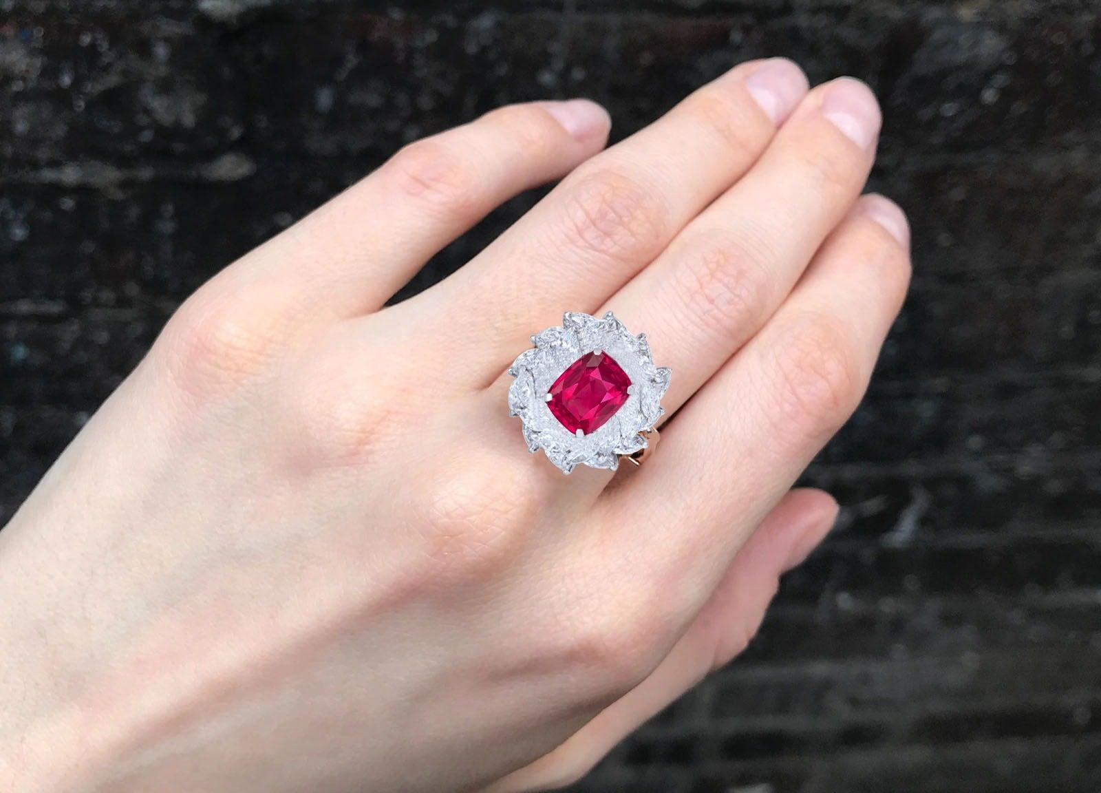 The centre stone is a 3 carat natural oval ruby . The ruby is held by 4 prongs and surrounded by marquise coloured white diamonds.

This ring was inspired and designed by Antinori Fine Jewels and handmade in Italy.

This cocktail ring is so stunning