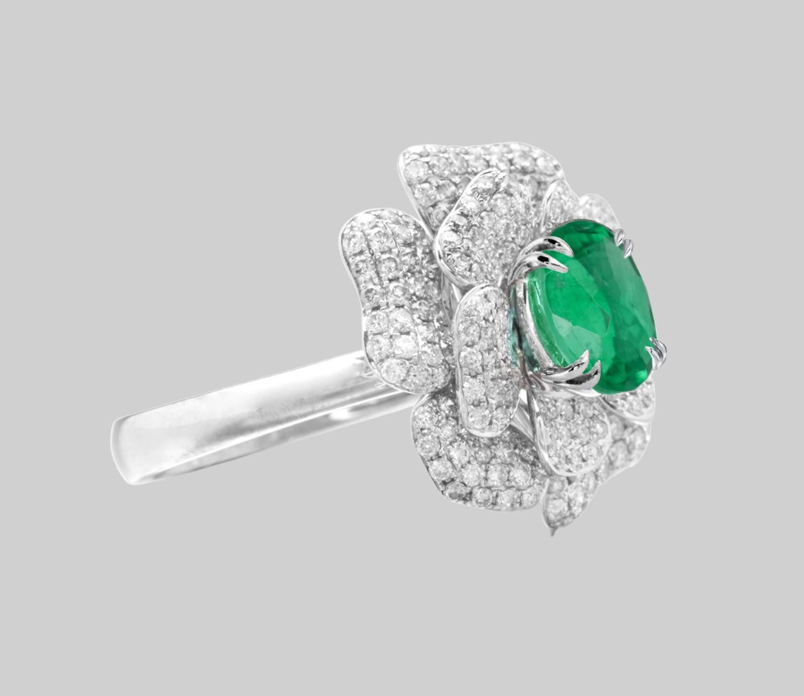 ELEGANT Colombian EMERALD AND DIAMOND RING 

This marvelous cocktail ring with exquisite pave of diamonds and set in platinum ring has a Rare  Colombian Emerald weighing 3.30 carats

 The real eye catcher is the gorgeous emerald that is surrounded