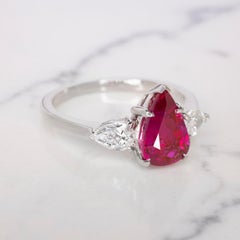 GRS Switzerland Pear Cut Ruby Three Stone Diamond Ring