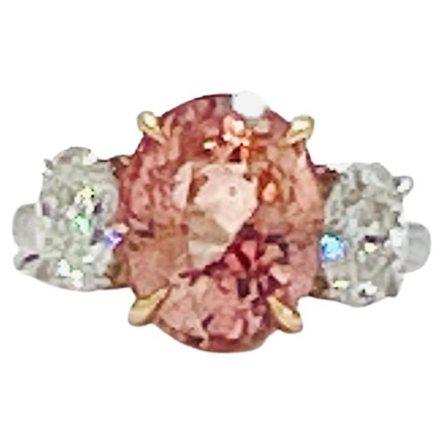 Atemberaubender 6,29 ct. ungeheizter GRS Sri Lanka Padparadscha Saphir oval mit 1,21 ct. G SI2 GIA weiße ovale Diamanten.  Handgefertigt in 18 Karat Gelbgold und Platin.  Ring Größe 6,5.  GRS und GIA eingeschlossen.  
