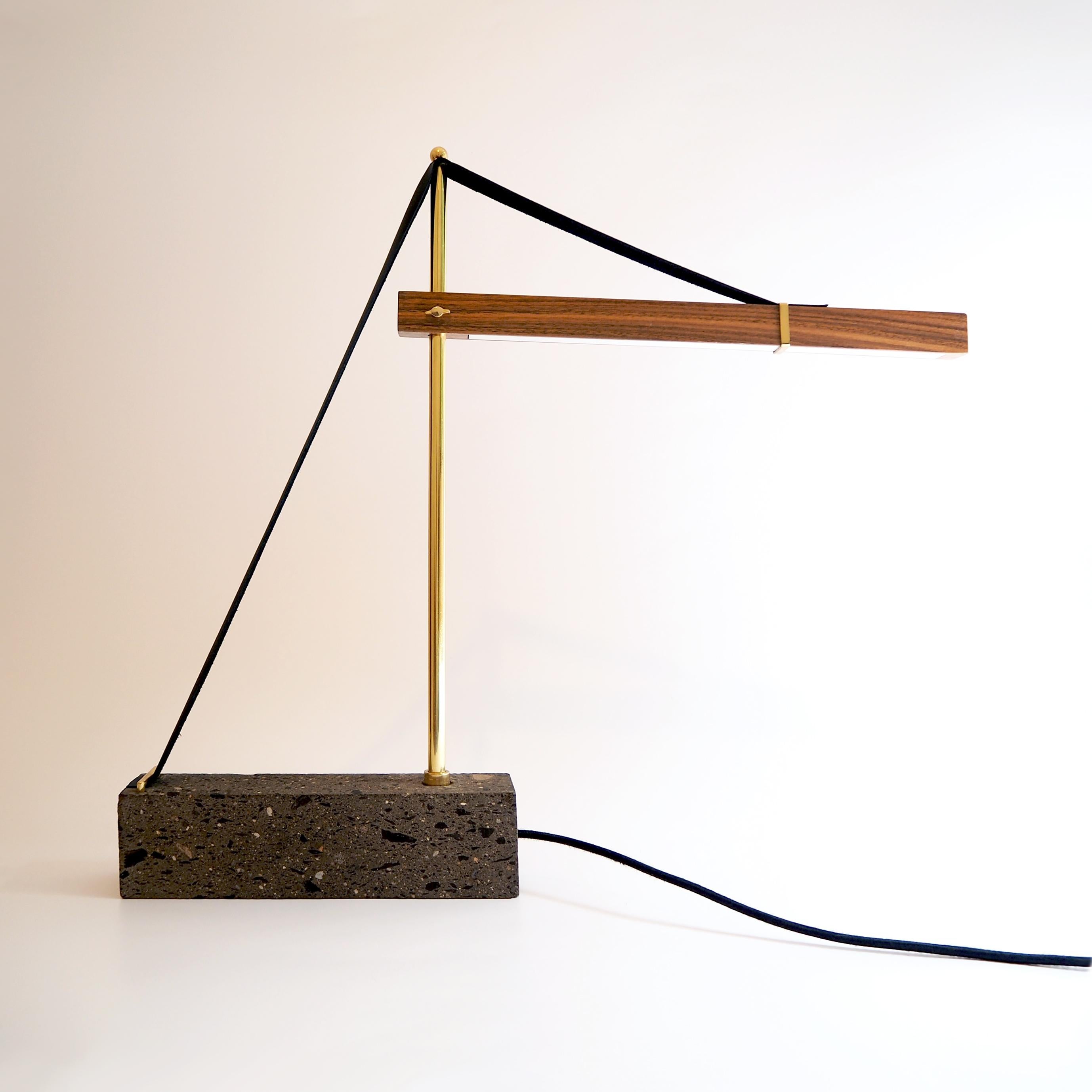 Grua lamp by Nomade Atelier
Dimensions: D15 x W 62 x H 50 cm
Material: Brass, walnut, stone, leather, LED Lighting
Weight: 10 kg

All our lamps can be wired according to each country. If sold to the USA it will be wired for the USA for