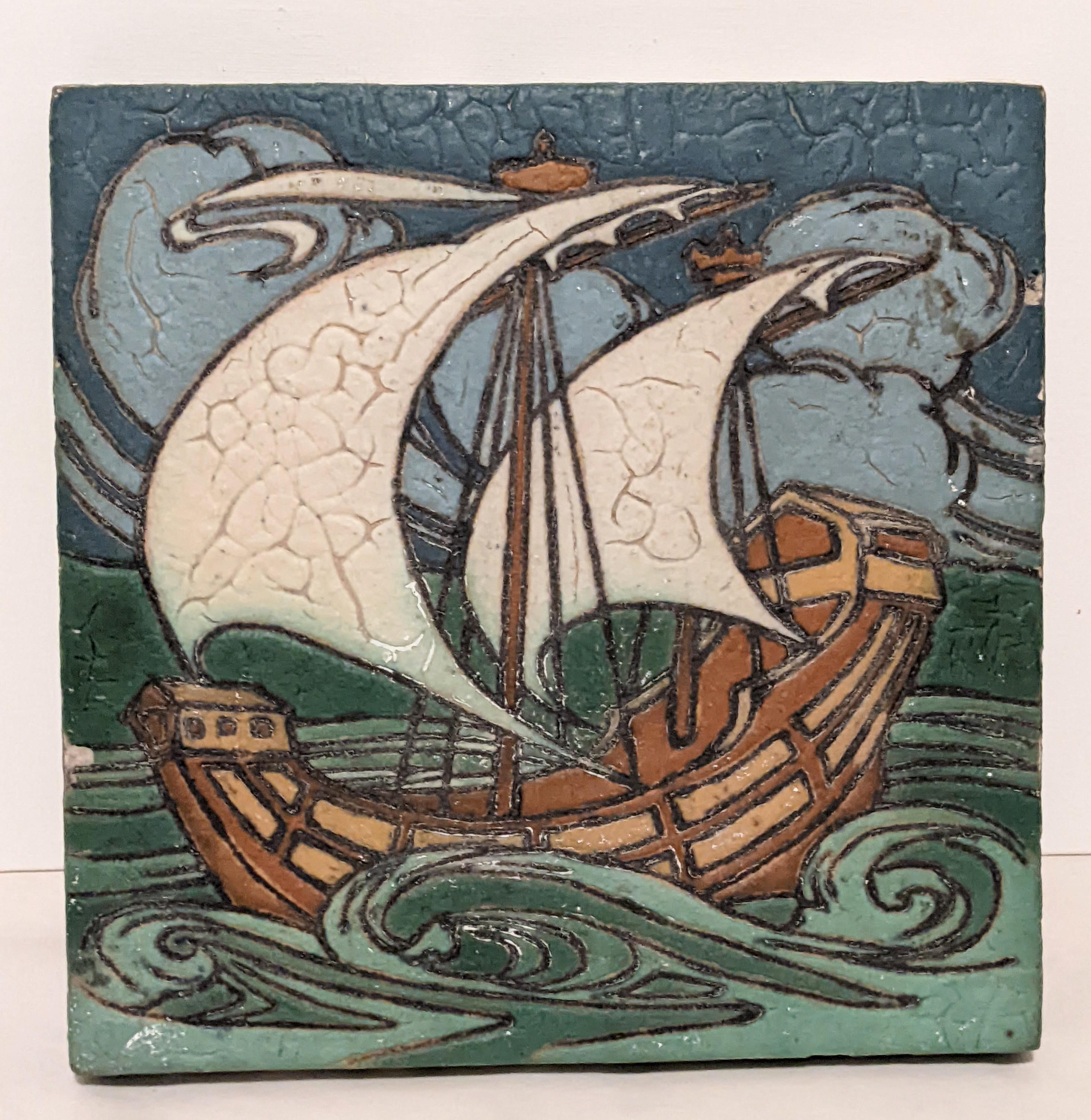 Grueby Faience Company Schooner tile circa 1905, vibrantly colored glazed earthenware circa 1905. Lovely period example.
 