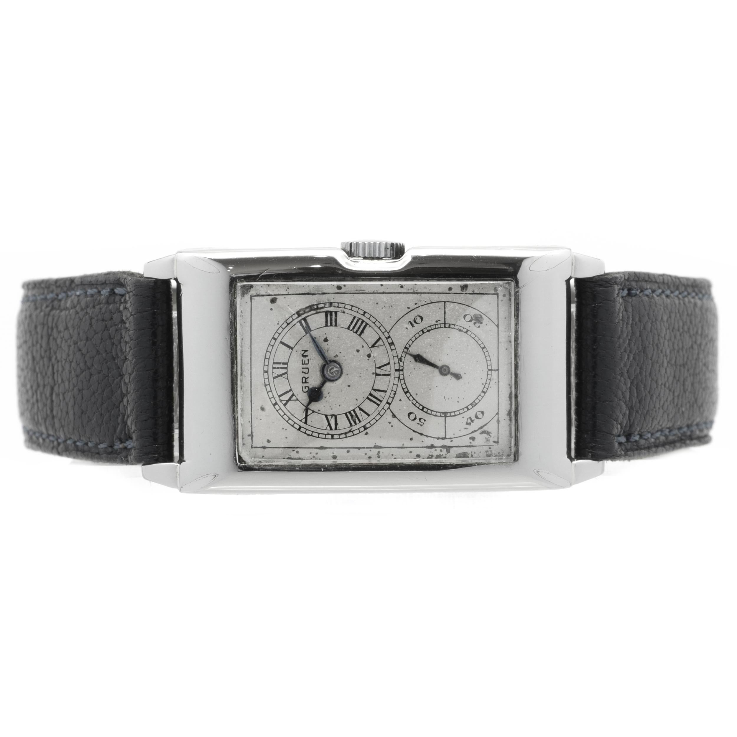 Movement: manual wind
Function: hours, minutes, seconds
Case: Rectangle 35 X 21mm 14K white gold filled case, winding crown on the side of the case, plastic crystal
Dial: silver roman dial with blue hands
Band: Navy Cartier strap with buckle

No box