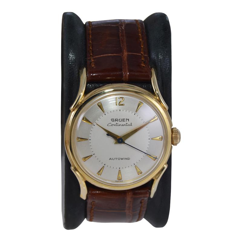 FACTORY / HOUSE: Gruen Watch Company
STYLE / REFERENCE: Art Deco Round / Ref, 769
METAL / MATERIAL: 14Kt. Solid Yellow Gold 
DIMENSIONS: 39 mm X 31 mm
CIRCA: 1940's 
MOVEMENT / CALIBER: Automatic Winding /  17Jewels / cal. 48055
DIAL / HANDS: