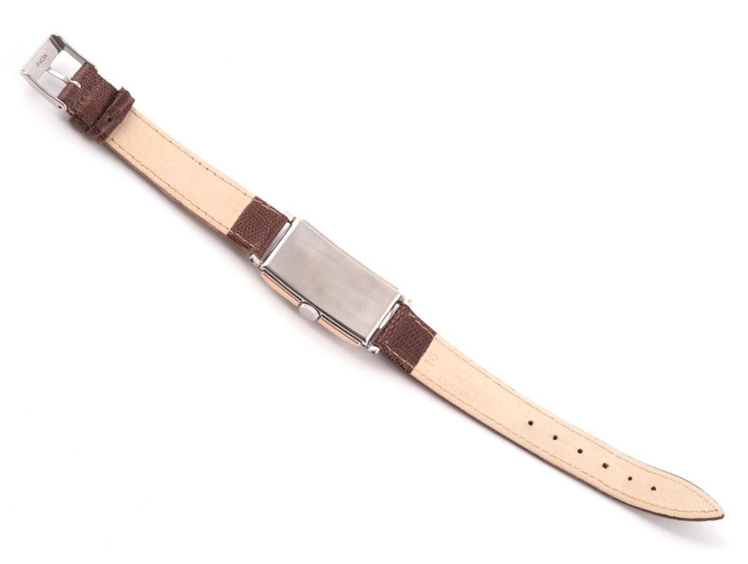 Art Deco Gruen Fine And Rare Rectangular Pink Gold And Stainless Steel Wristwatch 1930's