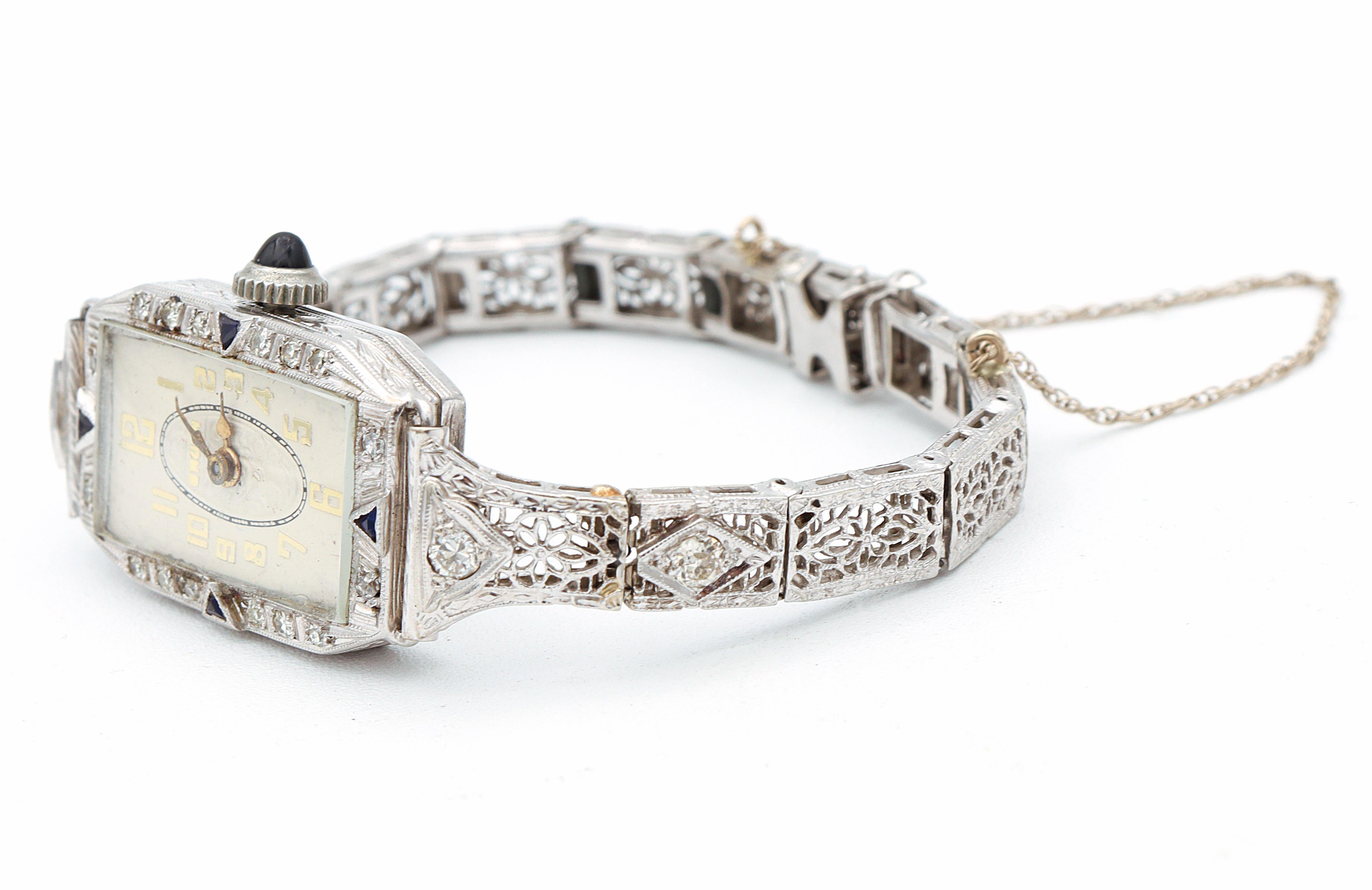 Gruen Platinum Case 14K White Gold Band Diamond Sapphire Women's Hand Wind Watch In Good Condition For Sale In New York, NY