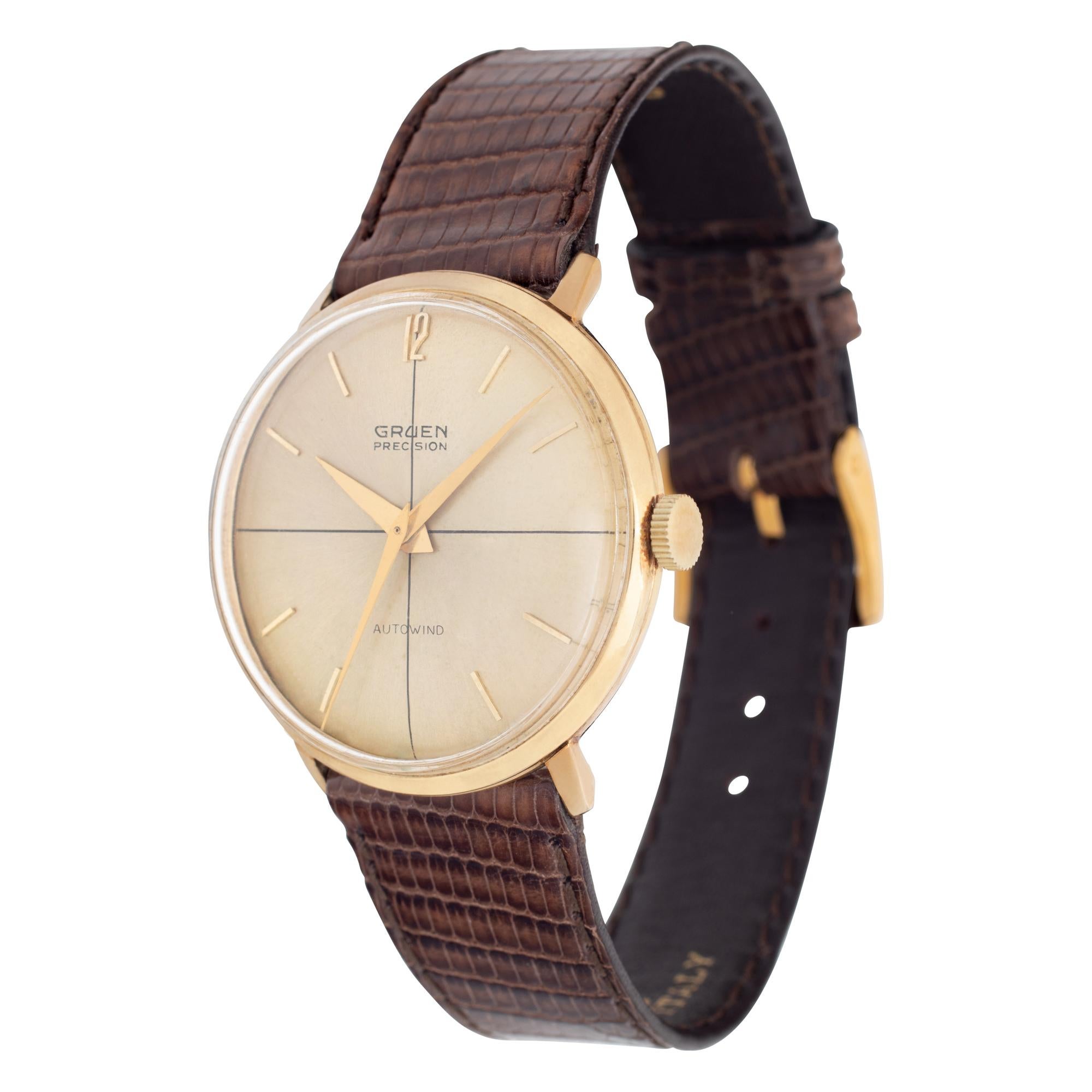 Vintage Gruen Precision Autowind in 14k yellow gold on a brown lizard strap. Automatic with sweep seconds. 33mm case size. Fine Pre-owned Gruen Watch. Certified preowned Vintage Gruen Precision watch is made out of yellow gold on a Brown Lizard