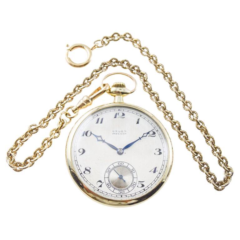 FACTORY / HOUSE: Gruen Watch Company
STYLE / REFERENCE: Open Faced Dress Pocket Watch / Hinged Back
METAL: 14Kt. Yellow Gold 
CIRCA: 1920's
MOVEMENT / CALIBER: Manual Winding / 17 Jewels / Micrometer Regulator
DIAL / HANDS: Original by Stern Freres