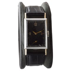 Reloj Gruen Art Decó de acero y oro de los años 30 con esfera original