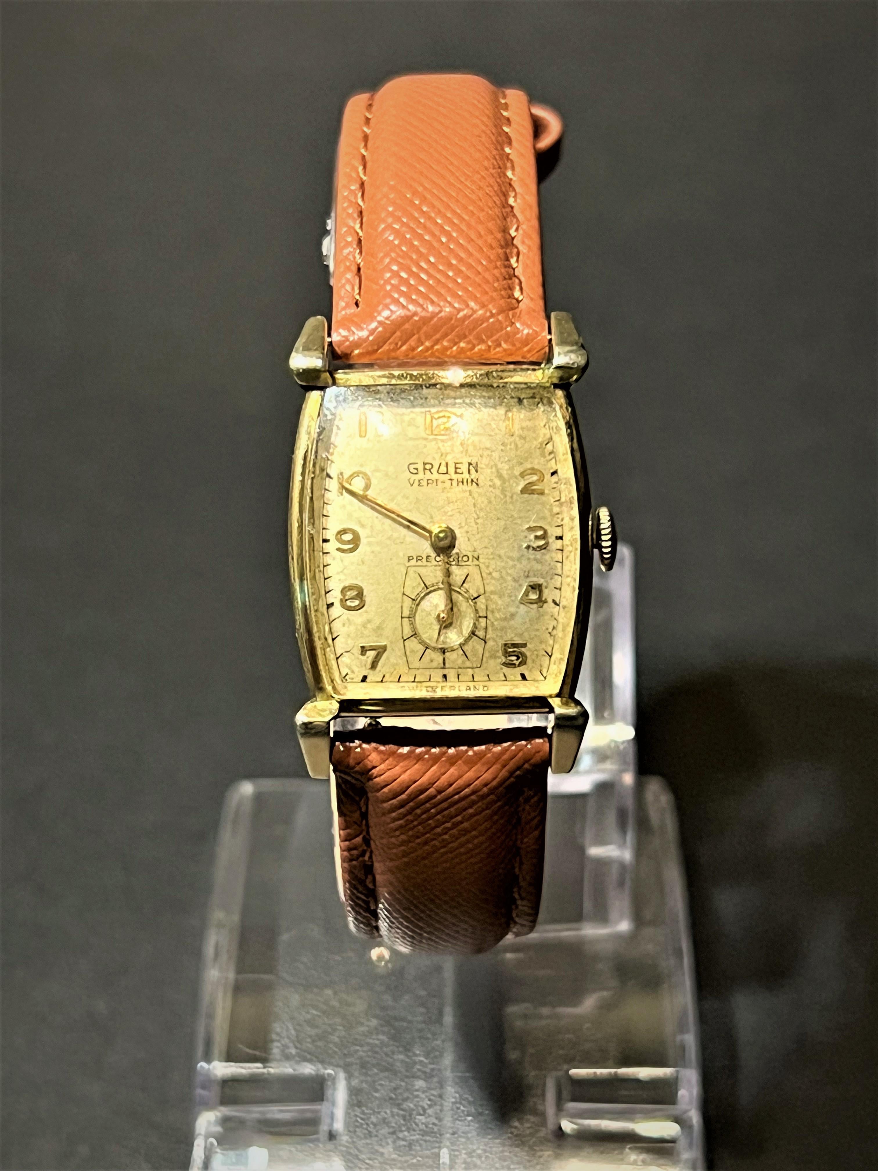 Brand: Gruen
Type: Wristwatch
Model Name: Veri-Thin
Bezel Material: 10K Yellow Gold-Fill
Case Material: 10K Yellow Gold-Fill
Caseback Material: 10K Yellow Gold-Fill
Movement: Automatic
Bracelet/Fob Material: Leather
Clasp Style: Buckle
Total Length: